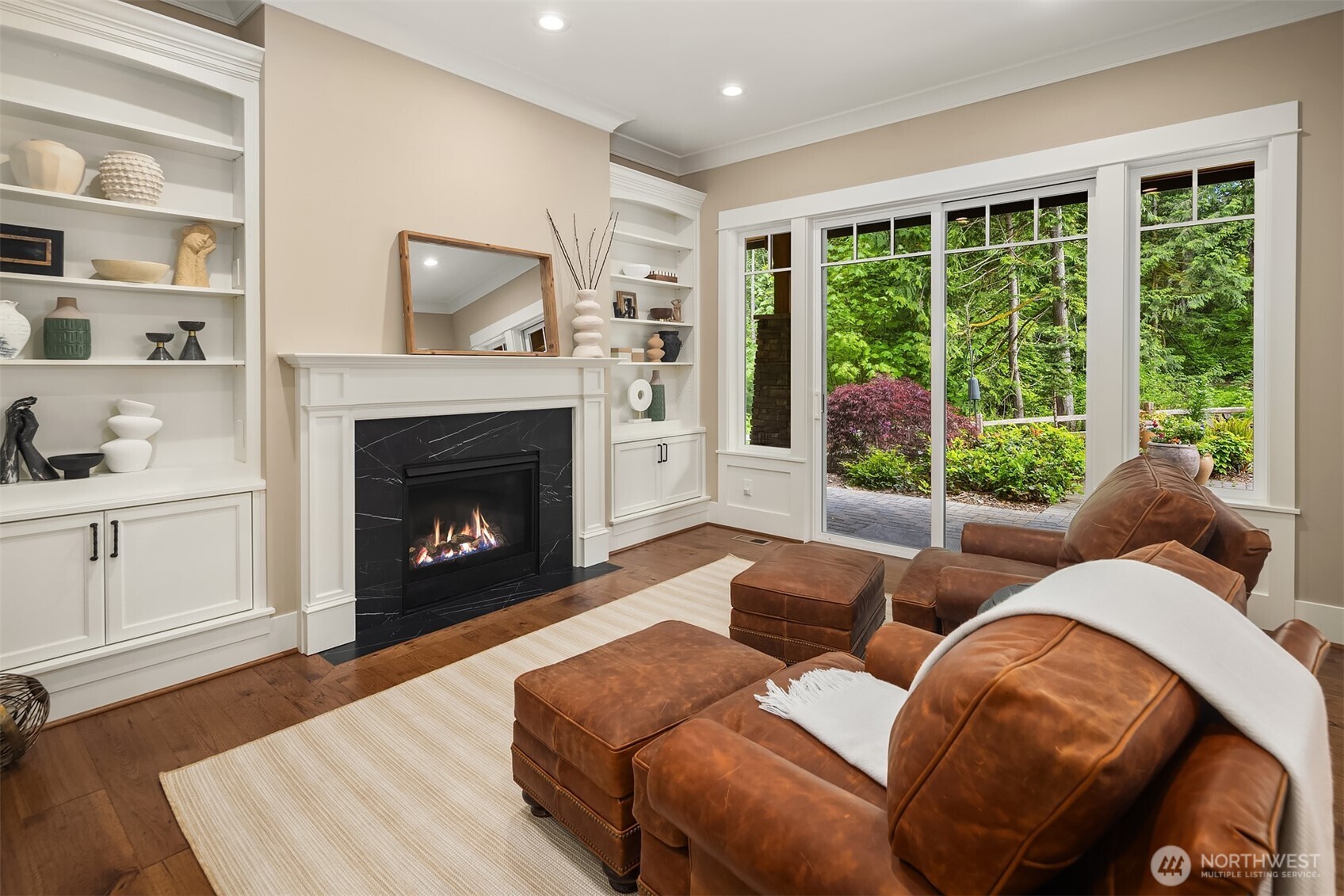 2nd Den on the main level or a "Snug Room" with gas fireplace and built in shelving.
