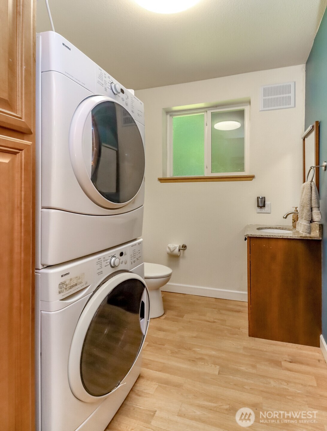 Laundry room & Half bath at the bottom of the stairs.
