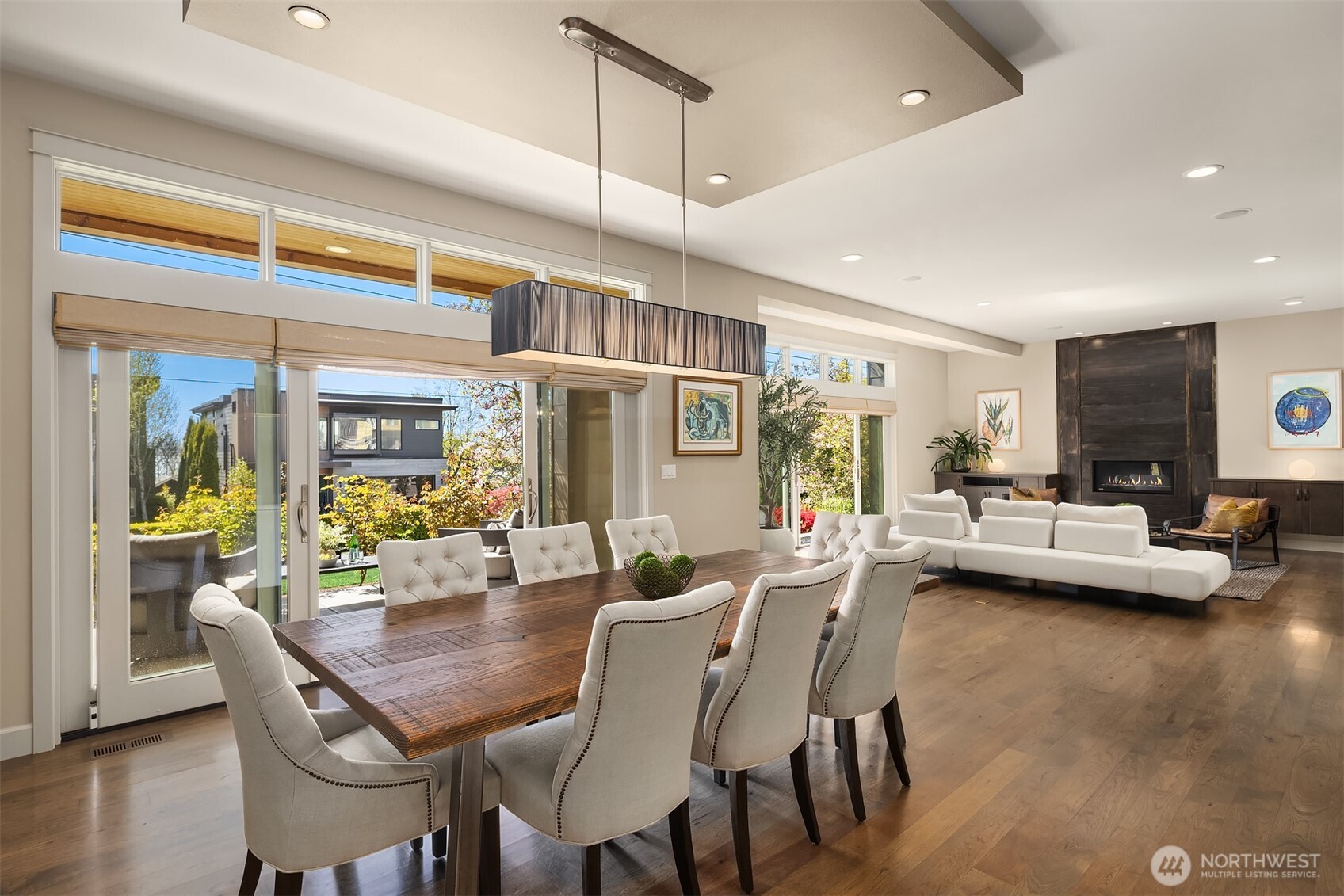 This generous dining area of the great room is perfect for both formal and informal dining. The built in bar and doors to the front patio make entertaining a breeze!