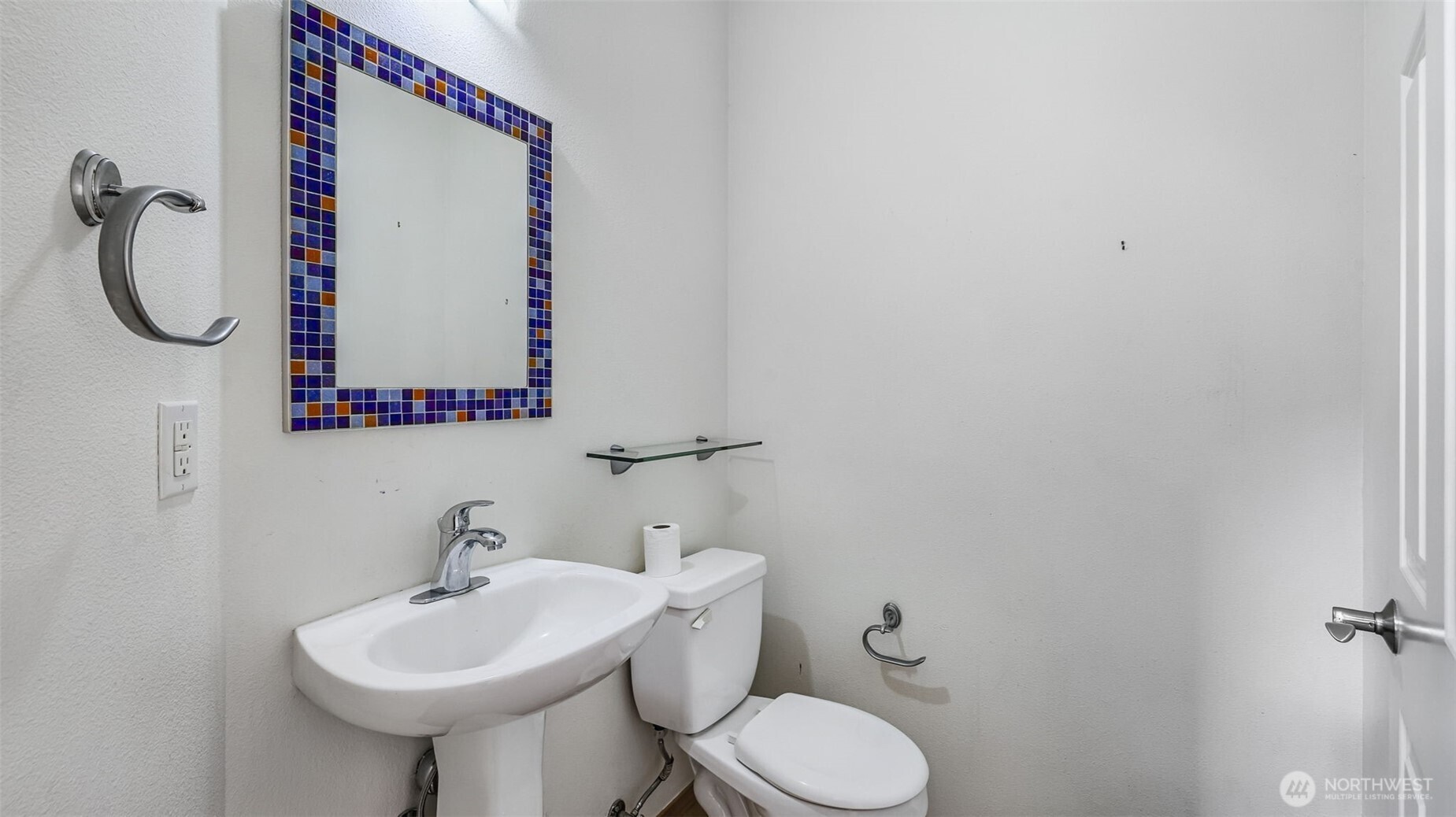 Downstairs half bathroom.