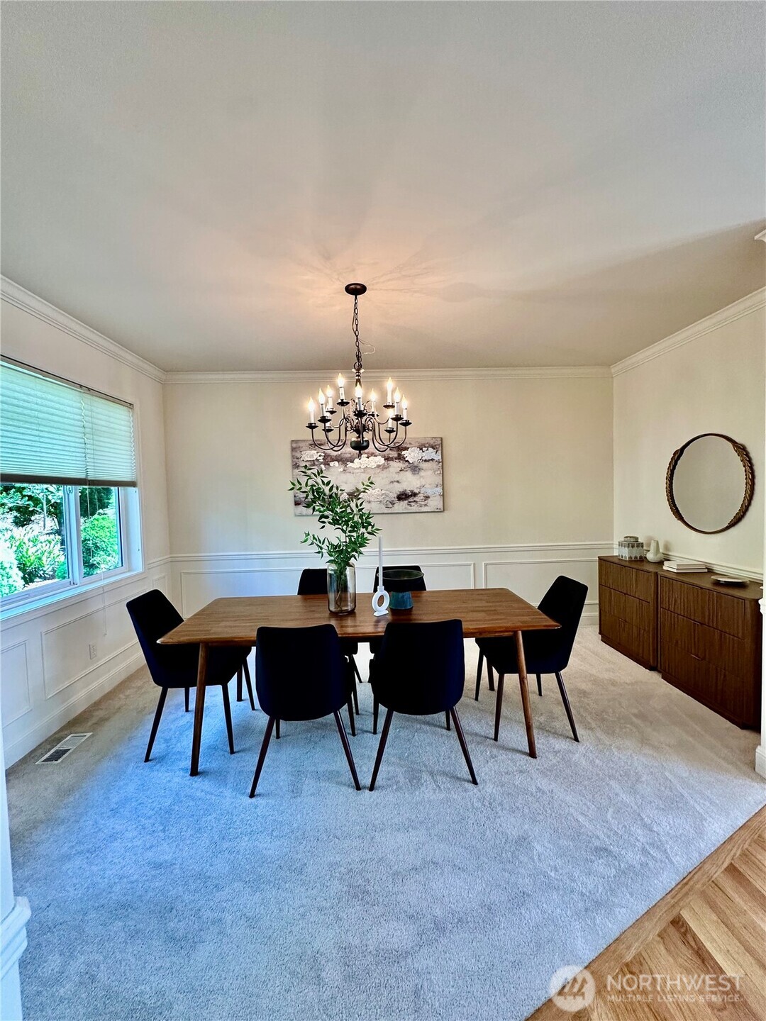 Large formal dining room with view of serene garden