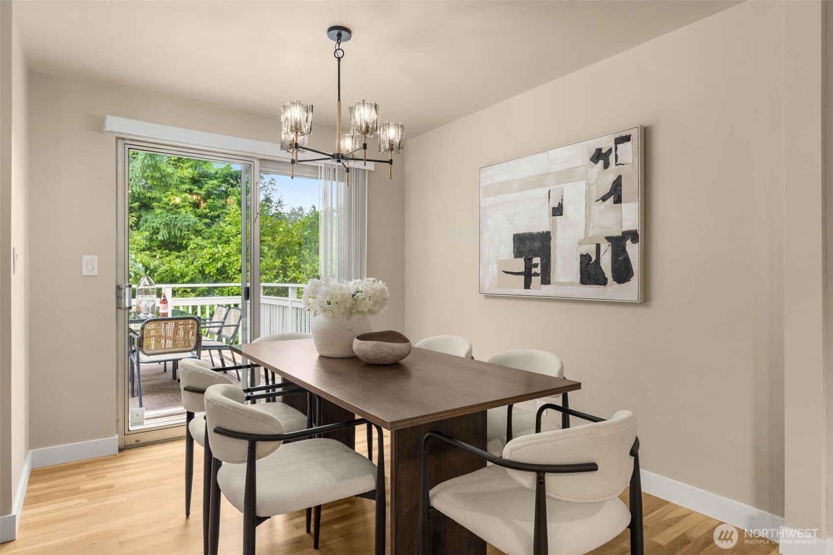 Large open dining area flows onto deck