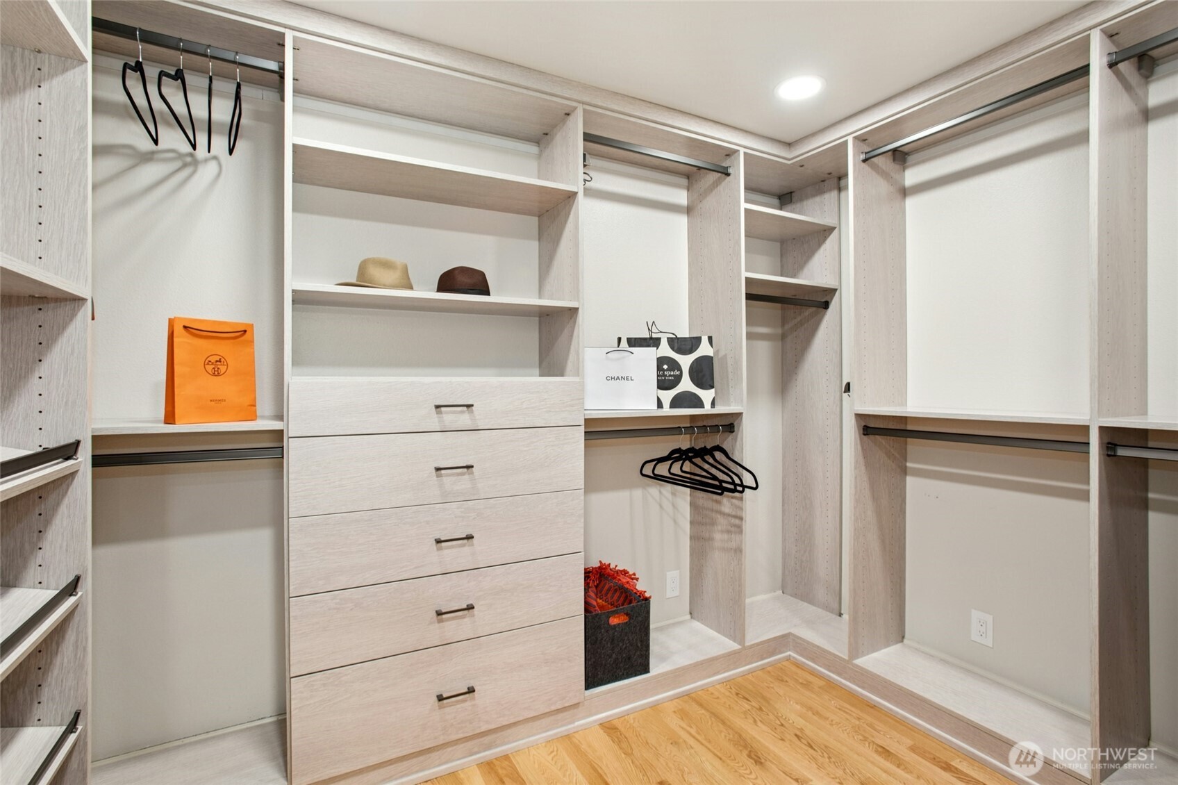 Custom closet system including built in mirror, scarf holder, belt holder, jewels drawer, etc... more to the right (not pictured)
