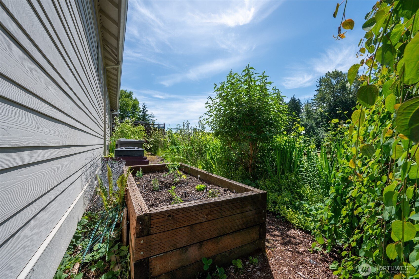 Incredible Sunny Entertaining Deck and Garden Space that offers complete Privacy