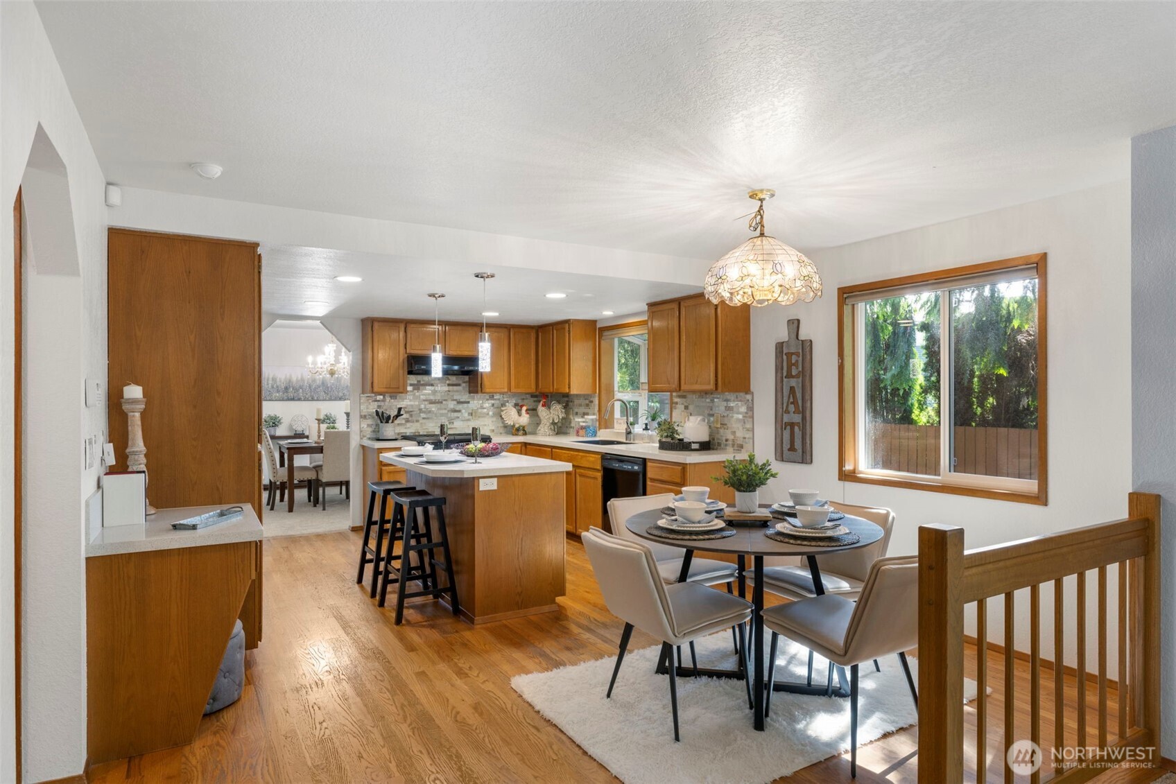 Breakfast nook with hardwoods.