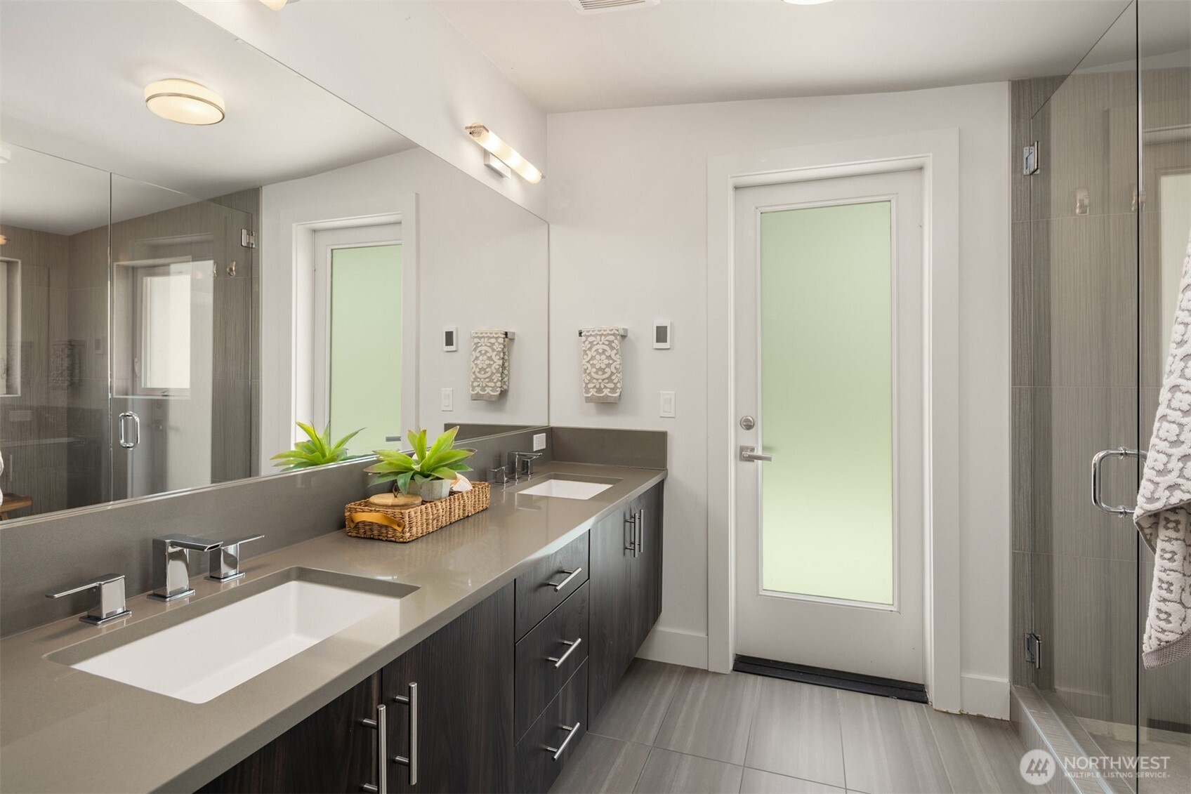 Primary bathroom also walks out to deck.