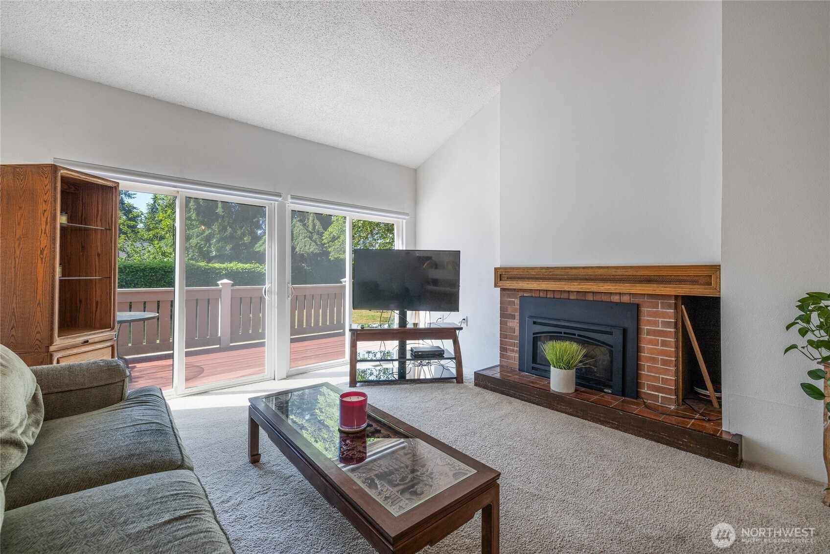 Cozy fireplace next to the two sliding doors