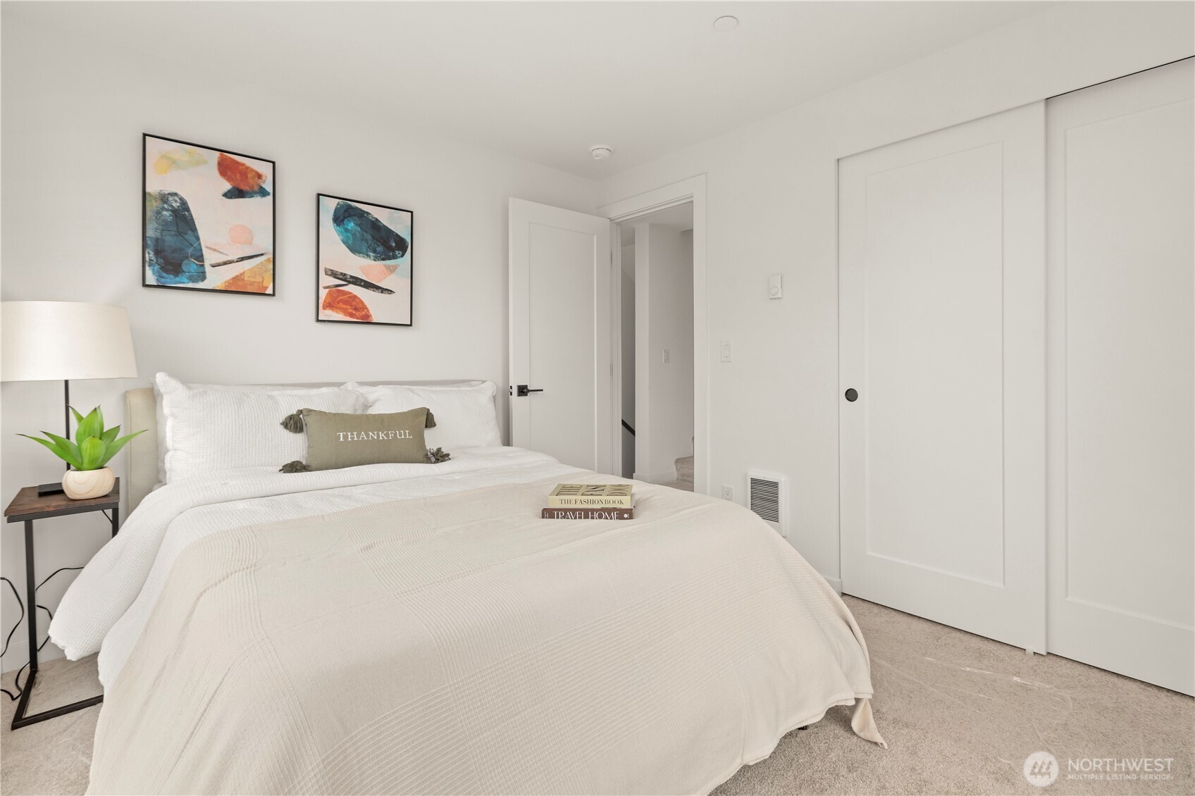 Photos are of a similar staged home.