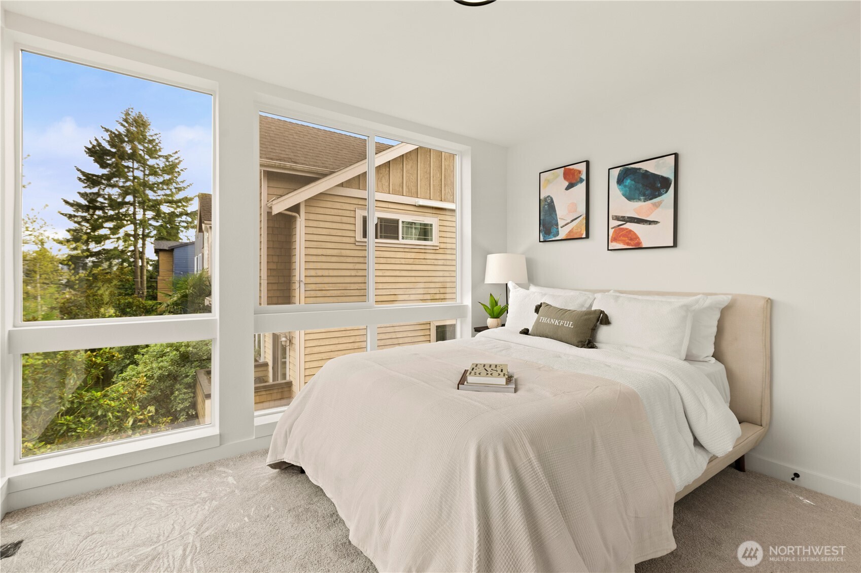 Photos are of a similar staged home.