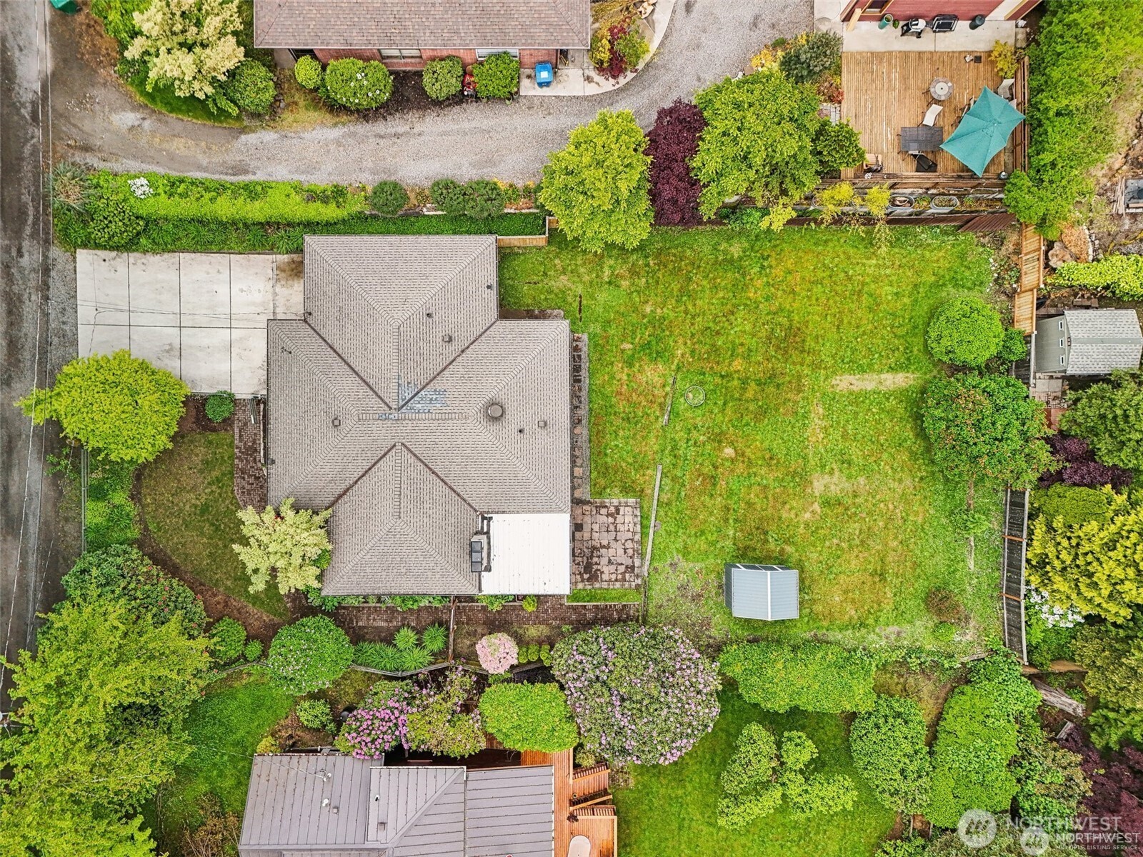 Birds eye view of the property showcasing the expansive lot.