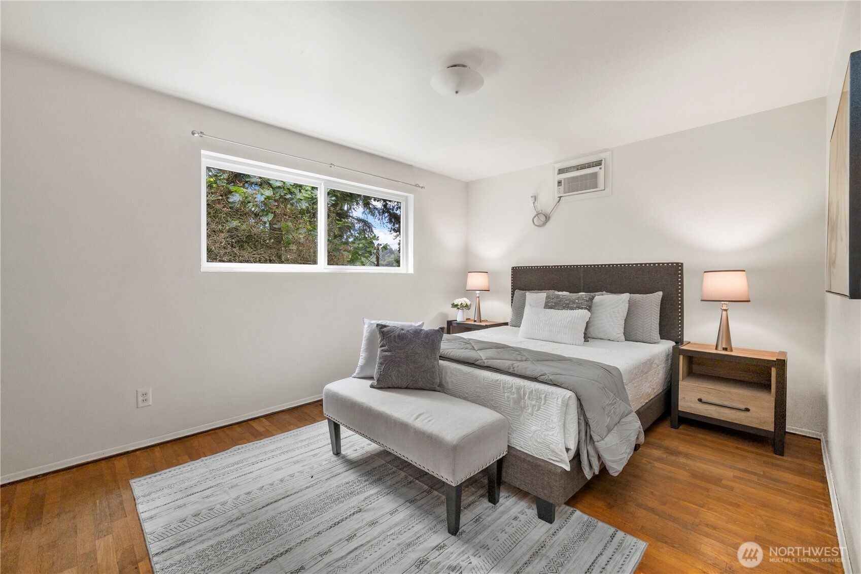 Primary bedroom, Alll bedrooms feature hardwood floors