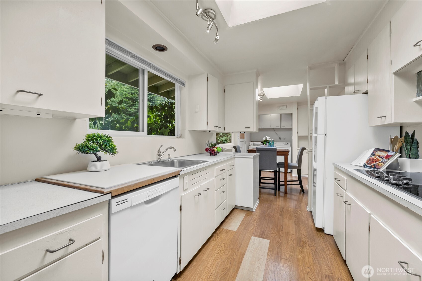 There are 2 large skylights one in the kitchen & one in the informal dining area