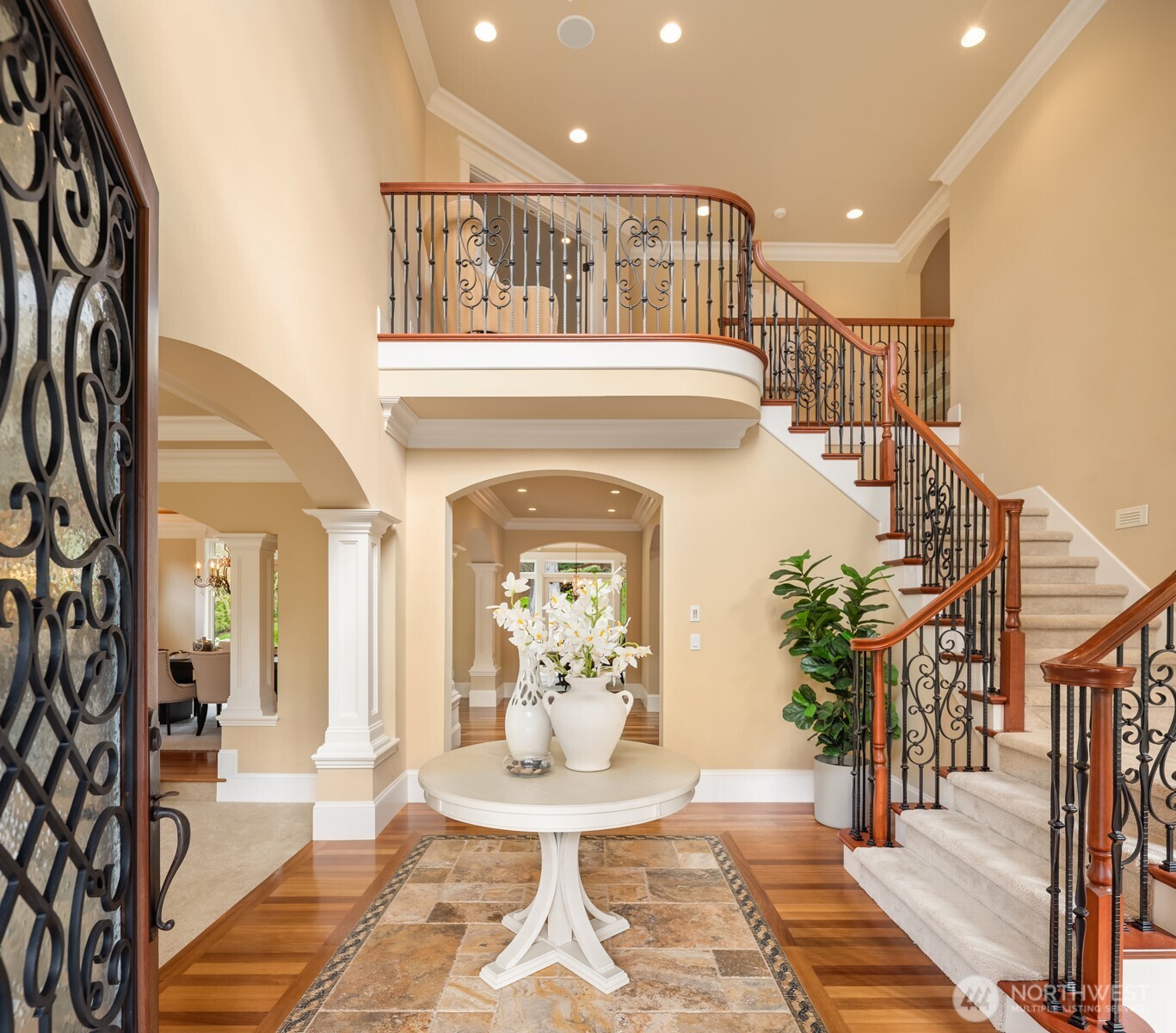 Wrought iron, Brazilian hardwoods, and stone mosaic in Reception Hall