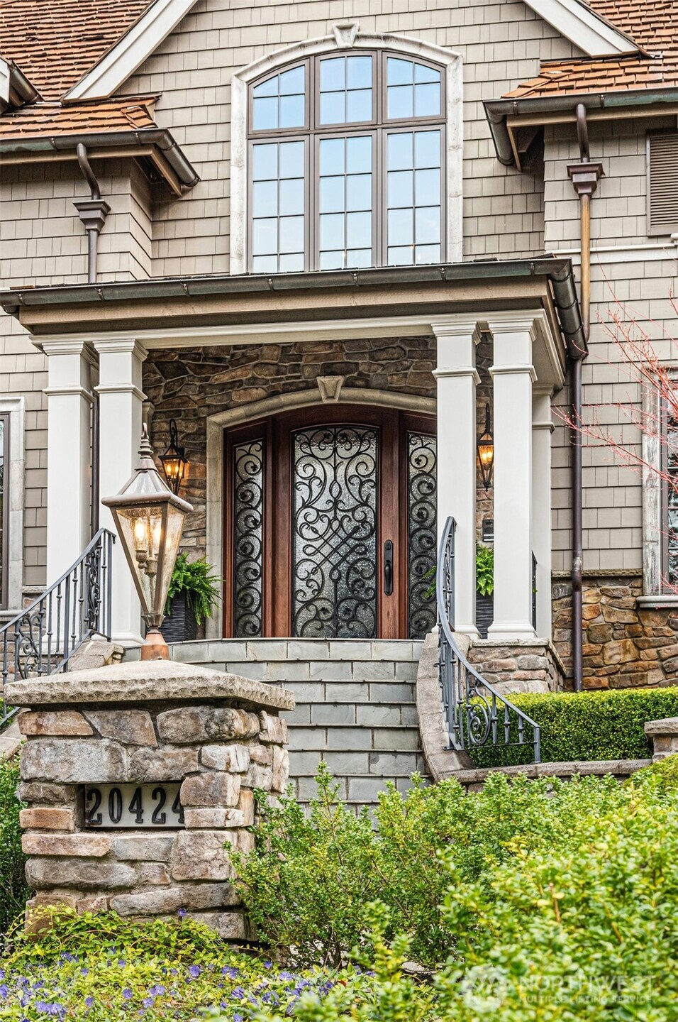 Stately presence with Pennsylvania blue stone entry steps and circular drive