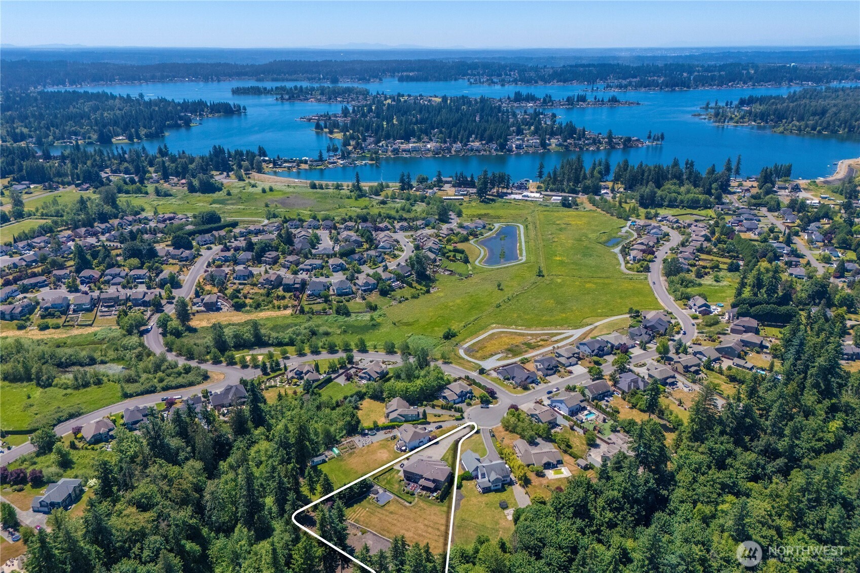Aerial picture showing how close Quiet Water is in relation to Lake Tapps & subject property lines actually extend past white line in back (lines are approx).