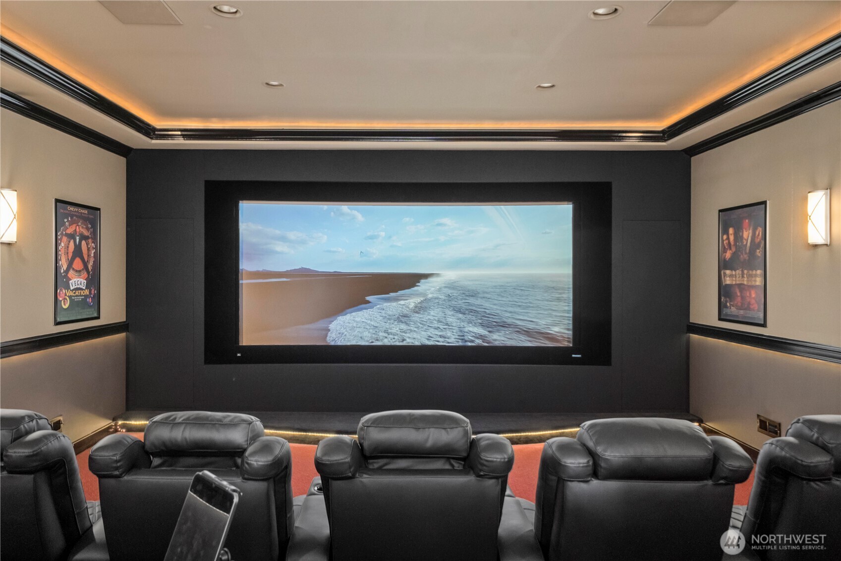 This is a legit theater room! 160" Stewart filmscreen side masking w/Runco projector.