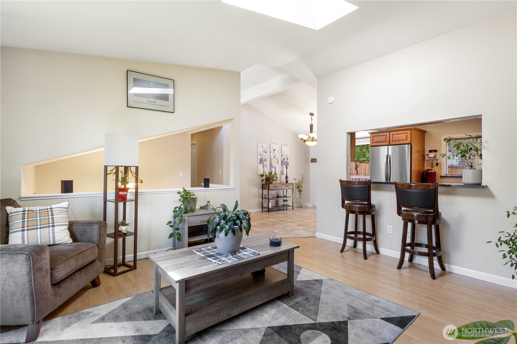 Fall in love with soaring vaulted ceilings, a bright skylight, and spacious living areas that offer room for everyone—this home truly checks all the boxes.