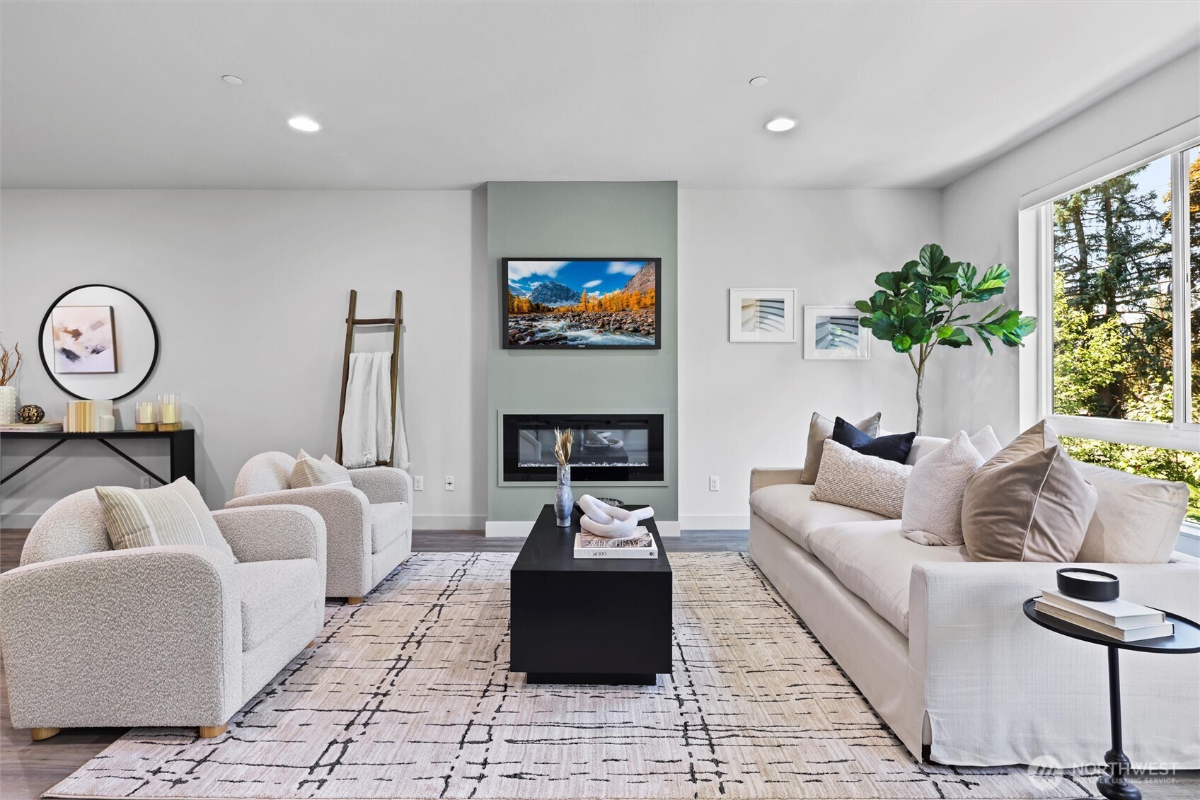 The expansive interior is filled with natural light. Every wall has been freshly painted.