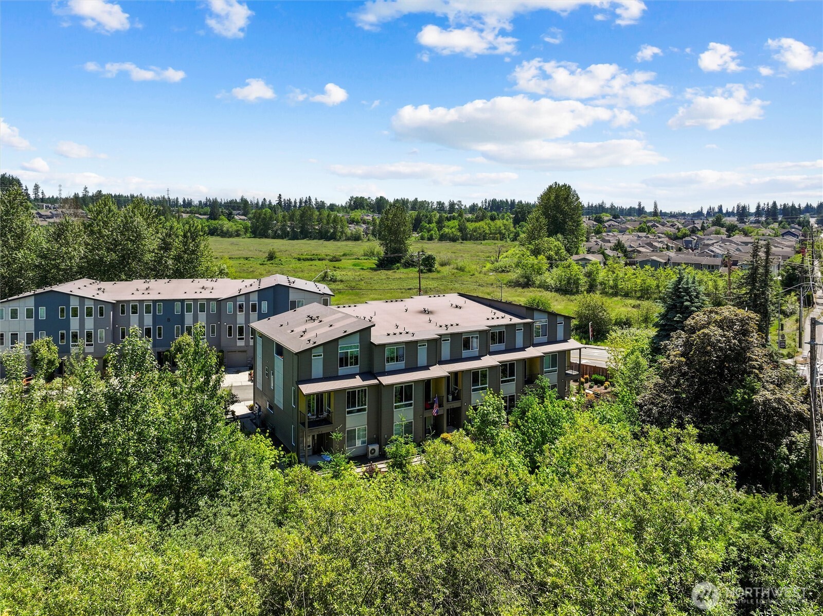 Surrounded by a peaceful greenbelt offering tranquil views of nature.