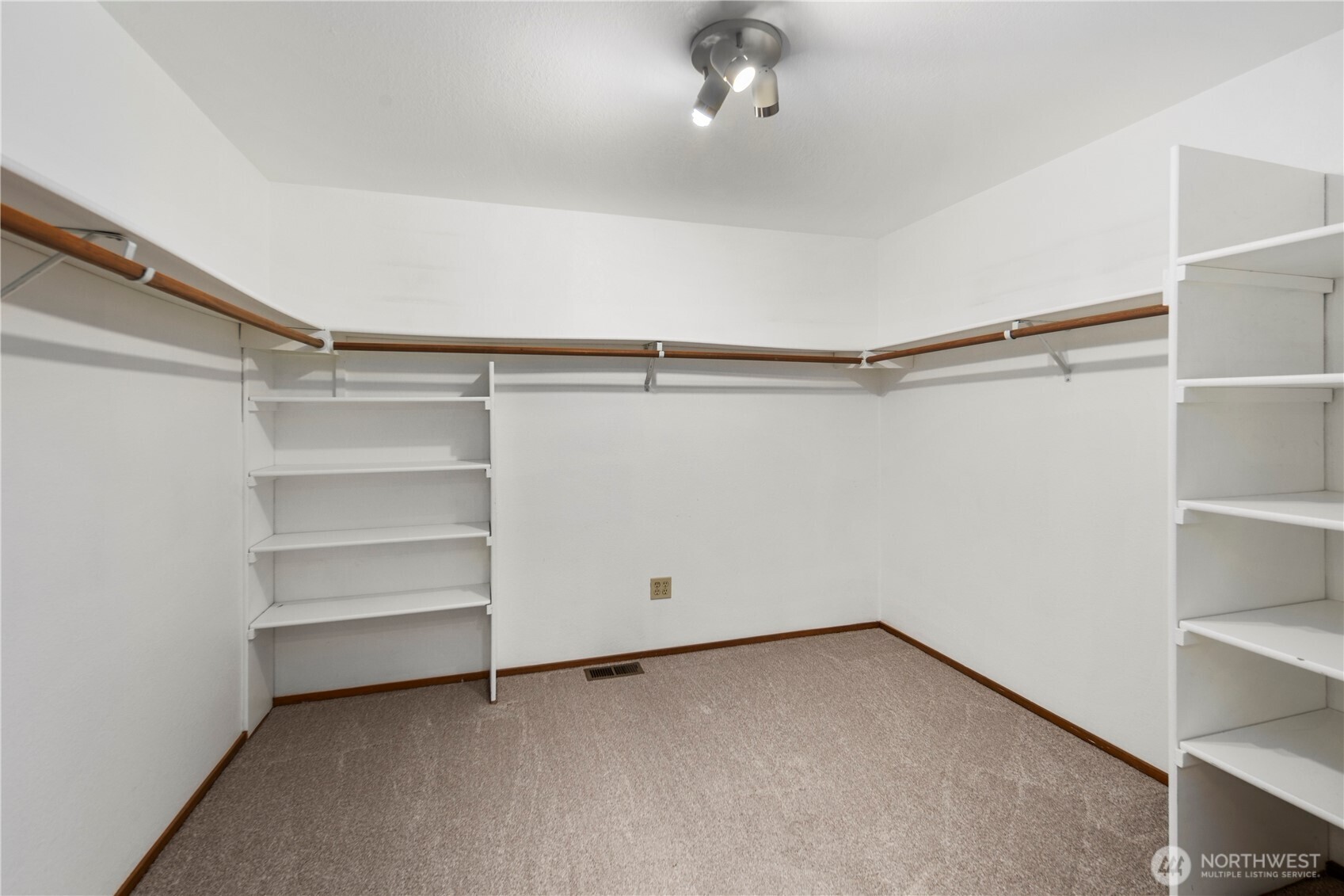 You’ll have to see this walk in closet to believe its size! Built in shelving make it a dream for organizing