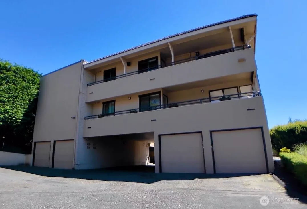 View from Parking Lot (Lower Left Garage attached to 2nd Level Unit)