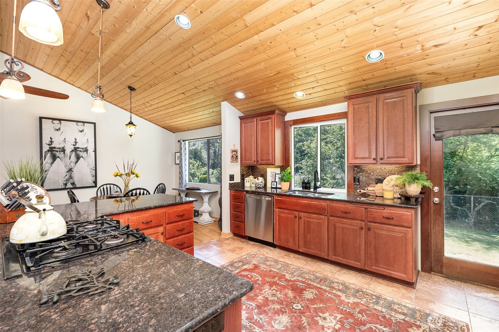 Enjoy looking out to your backyard with large window above the sink.