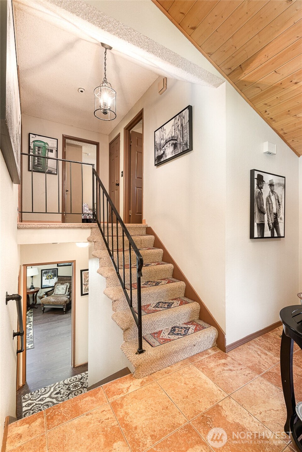Vaulted tiled entry way welcomes you in.