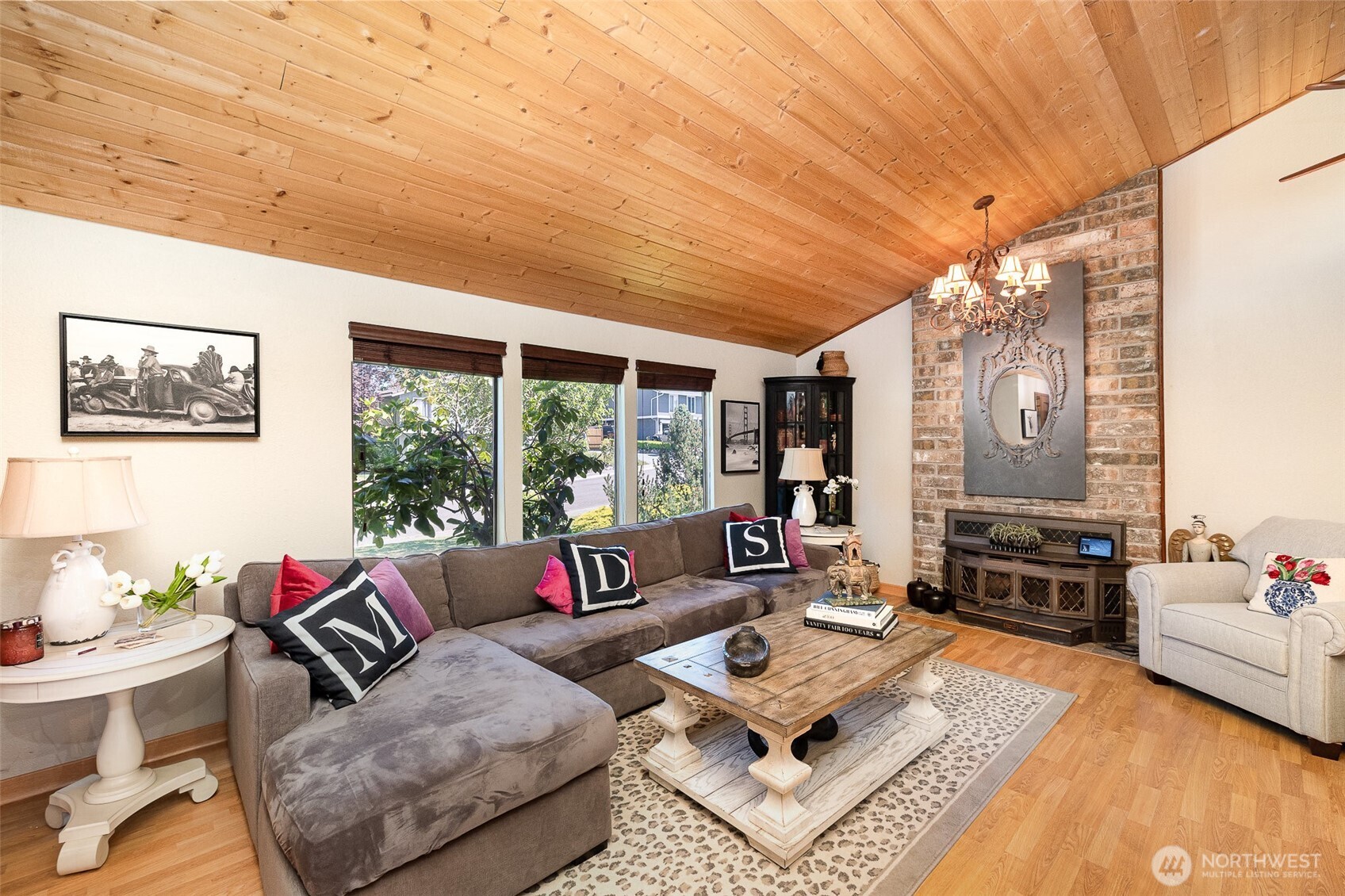 A great gathering space with brick fireplace.