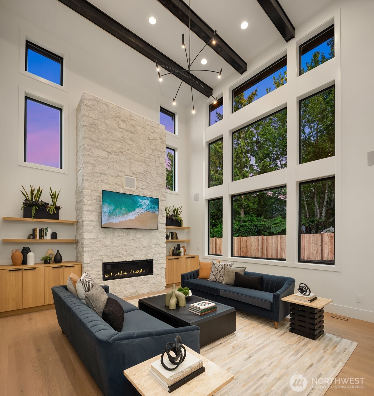 2 story great room that overlooks the private backyard