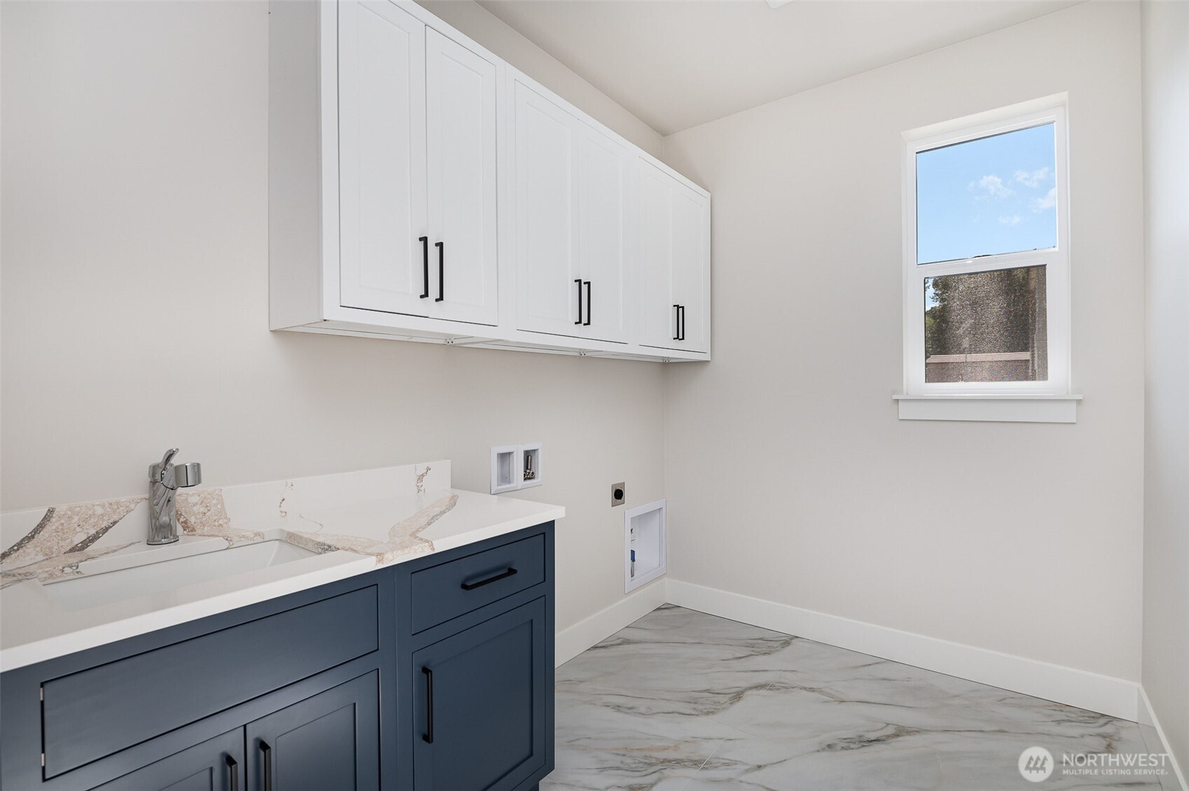 Utility Room with Upgraded cabinets.