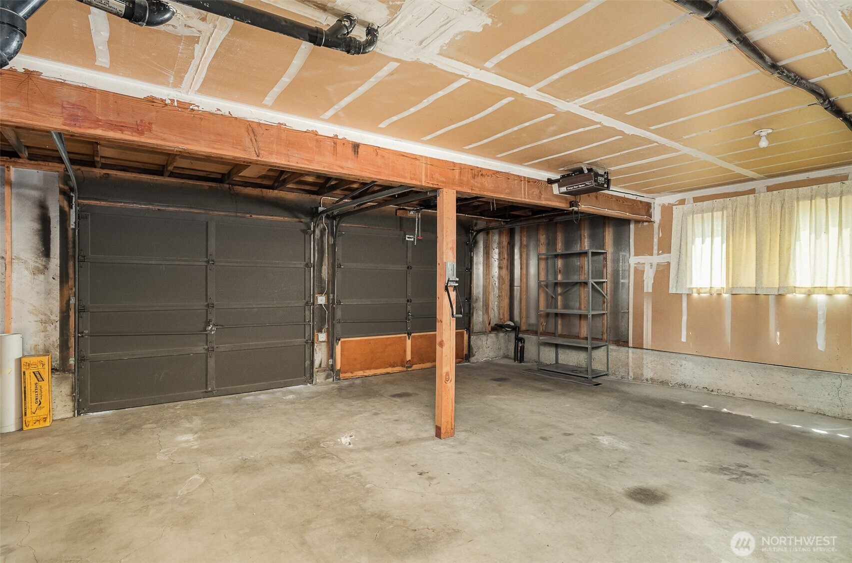 Spacious two-car garage offers plenty of room for parking and storage.