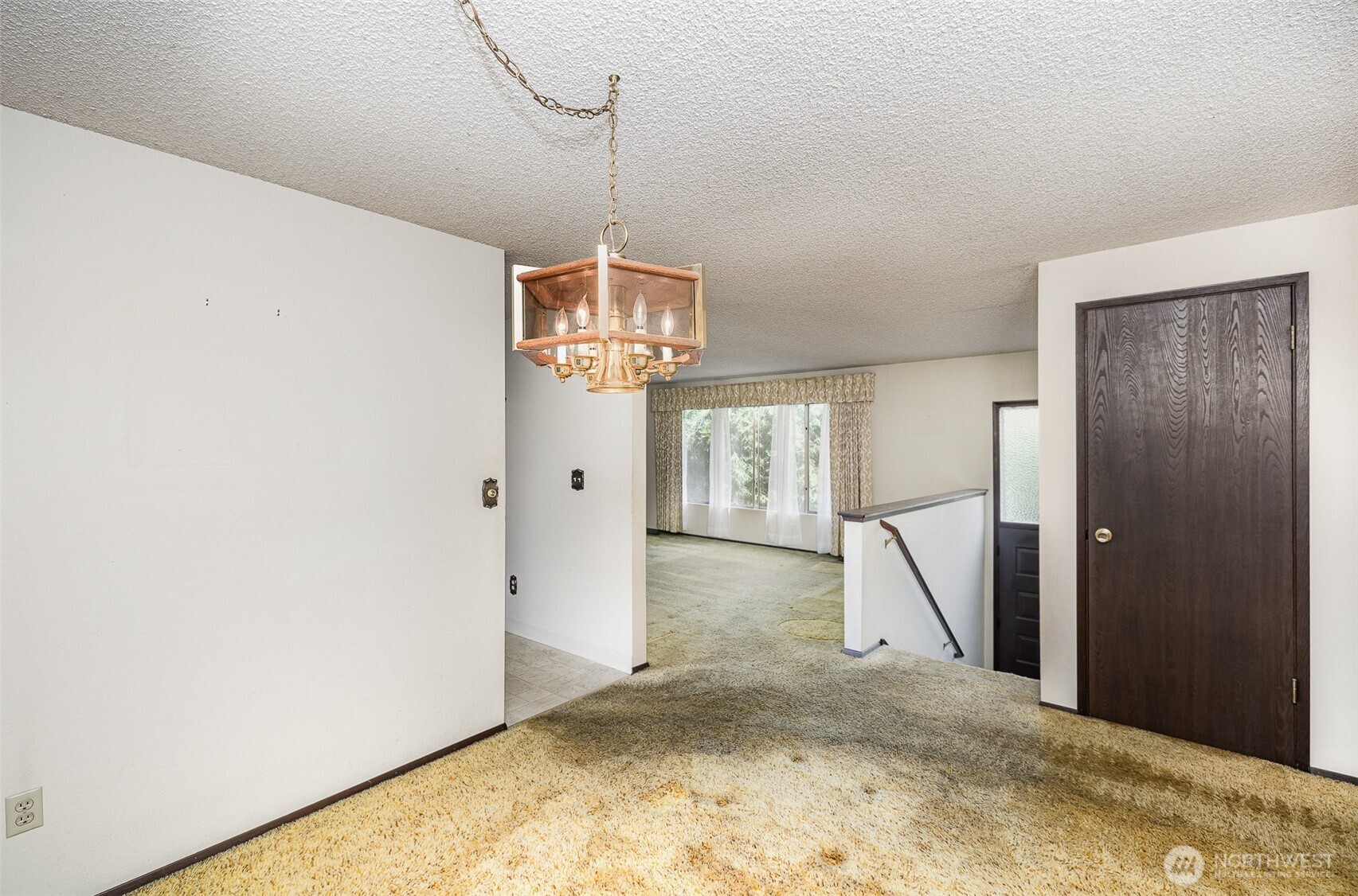 Dining room, peering into the living room.