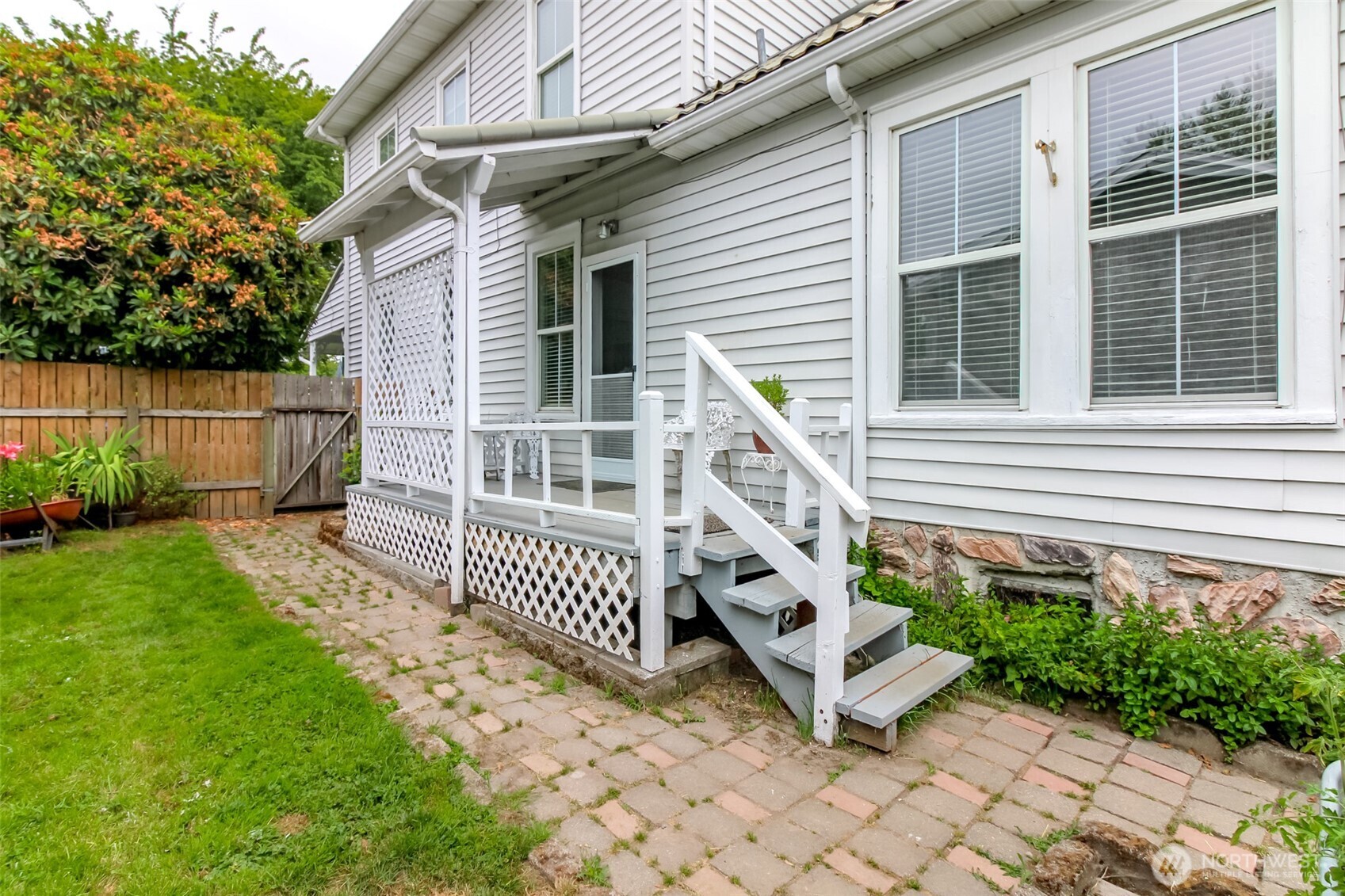 South side porch with paver sidewalk