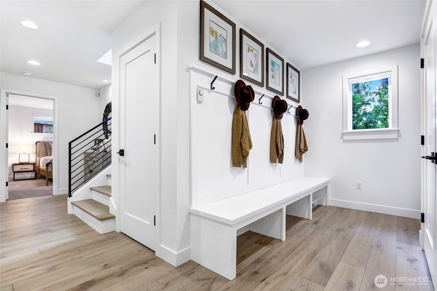 Mud room just off the entrance from the garage offers the perfect spot for your jackets, backpacks and shoes! It also has the perfect spot for a second refrigerator!