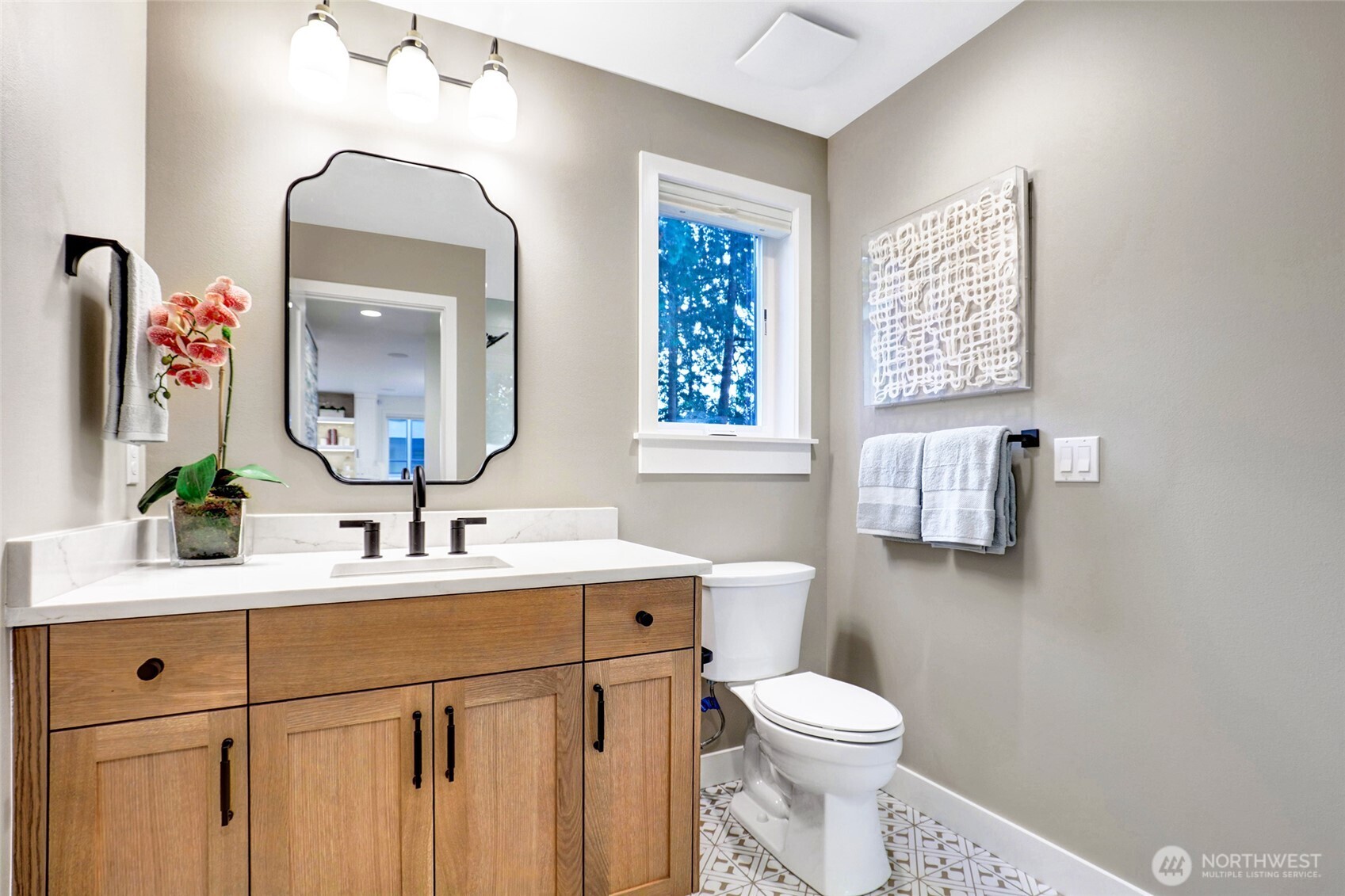 Main floor 3/4 bath is just off the main floor flex room/ 5th bedroom includes a shower, so no need to head upstairs!