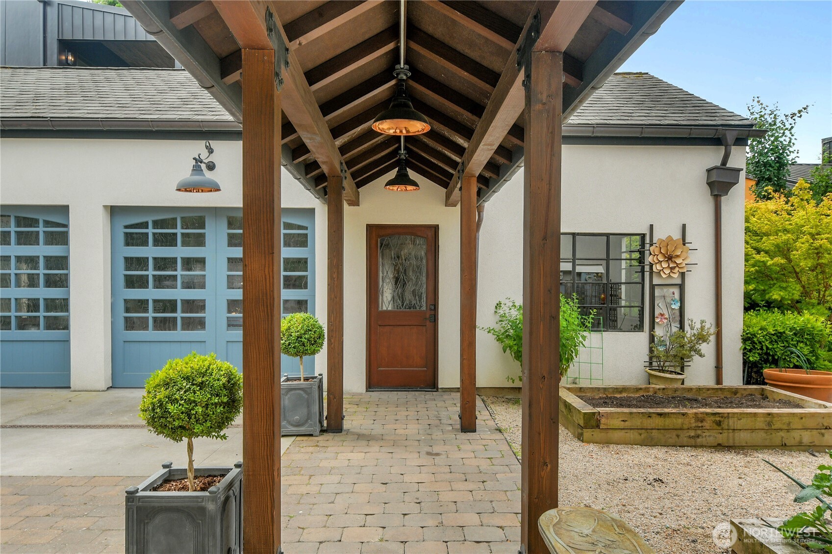 The home provides a detached 2 car garage with an attached 1 car space in the main home.