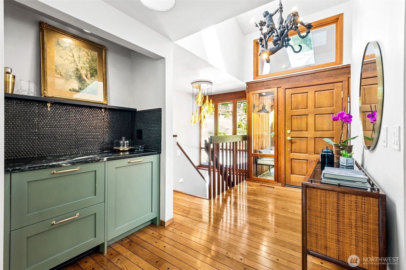 Looking from the entertainment alcove to the front of the house. These shelves and doors were designed to be minimalist in design, and all three are independent fridges or freezers, depending on what you need and want.