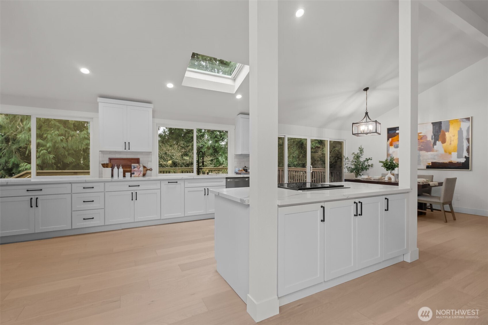 Storage space abounds with island cabinetry, as well as uppers and lowers.