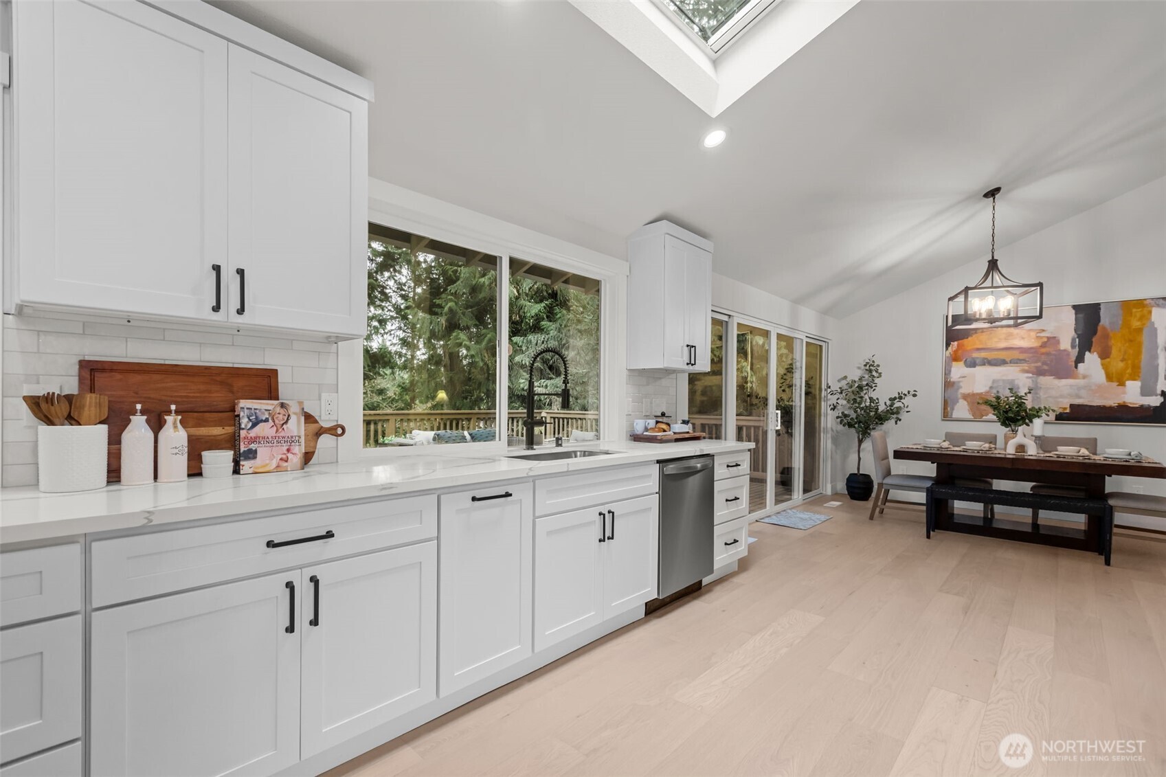 Huge kitchen windows could also be used to pass things through to friends on the deck.