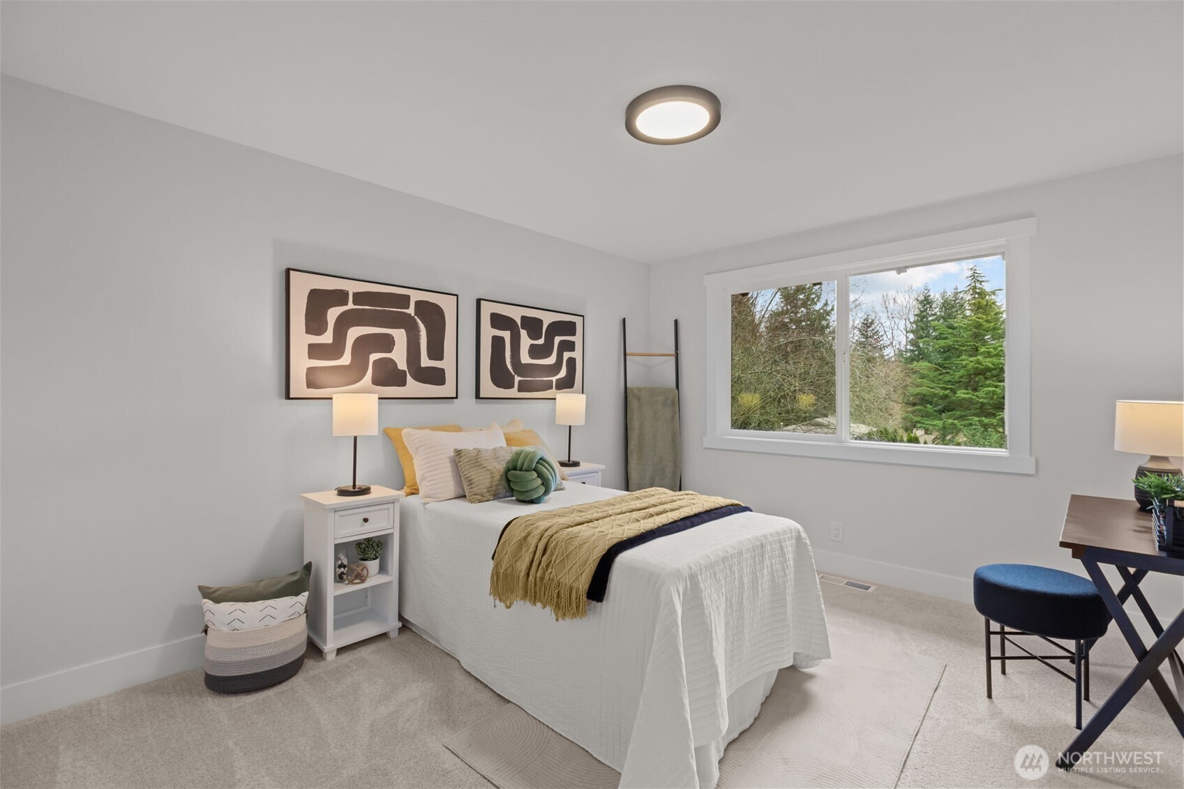 Upstairs bedroom number two provides plenty of room as well as peaceful views.