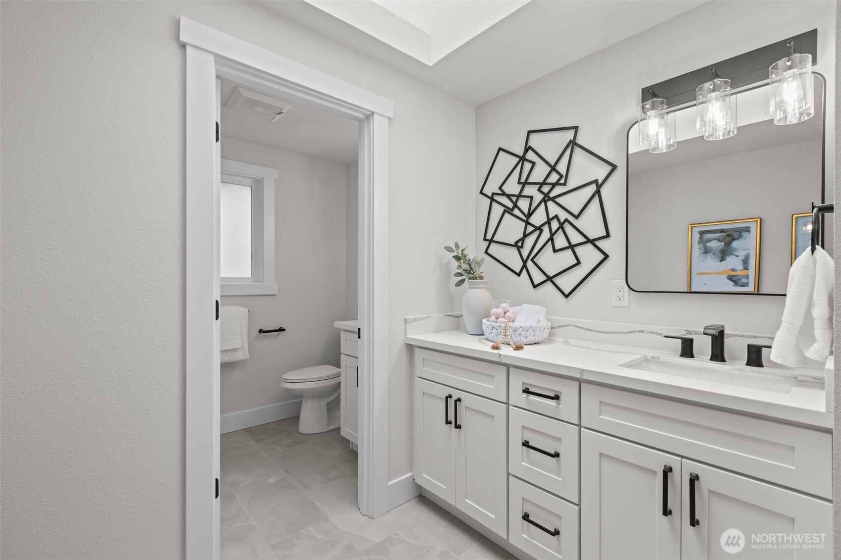 A second full bathroom upstairs with plenty of sinks so no one has to share.