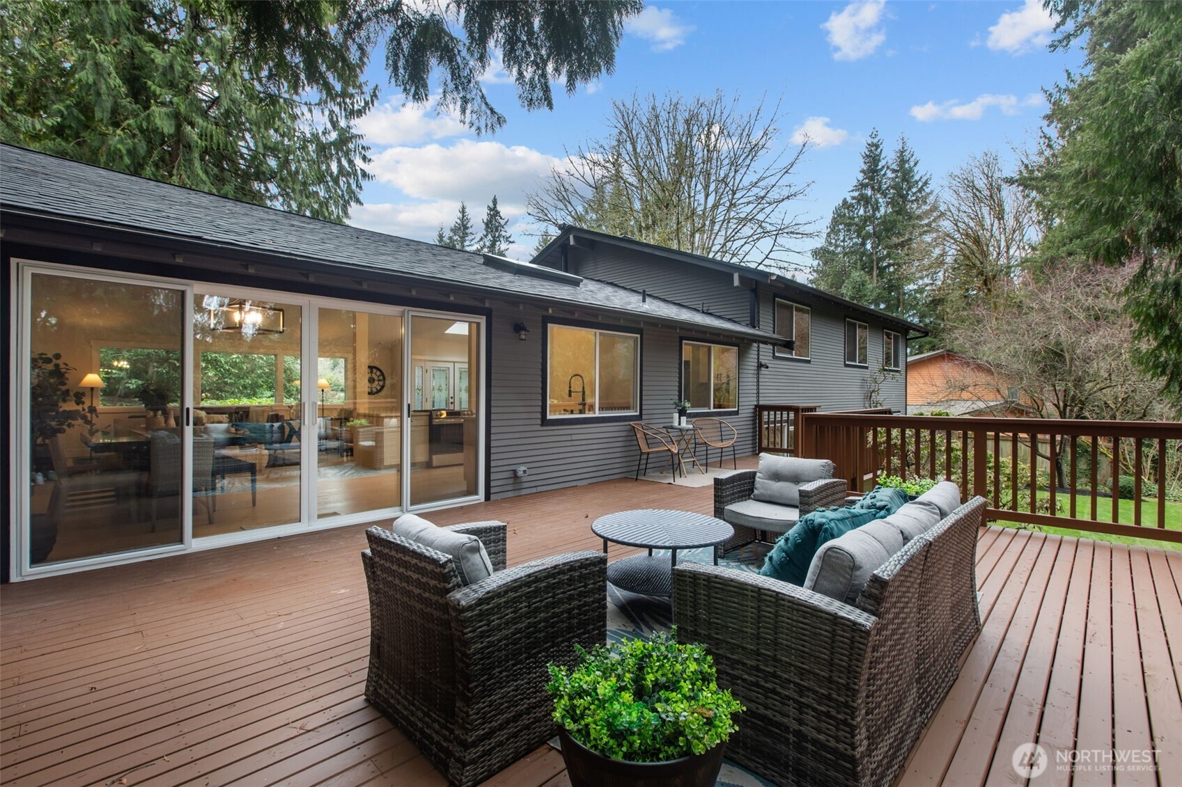 Don't miss the massive, brand new entertaining deck just outside the great room.