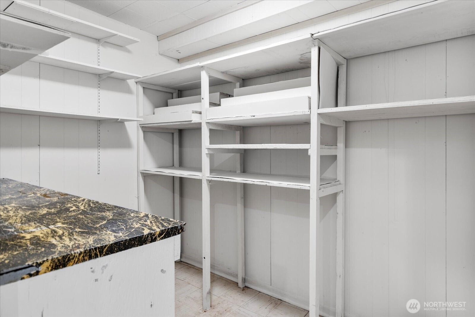 Large walk-in pantry on lower.