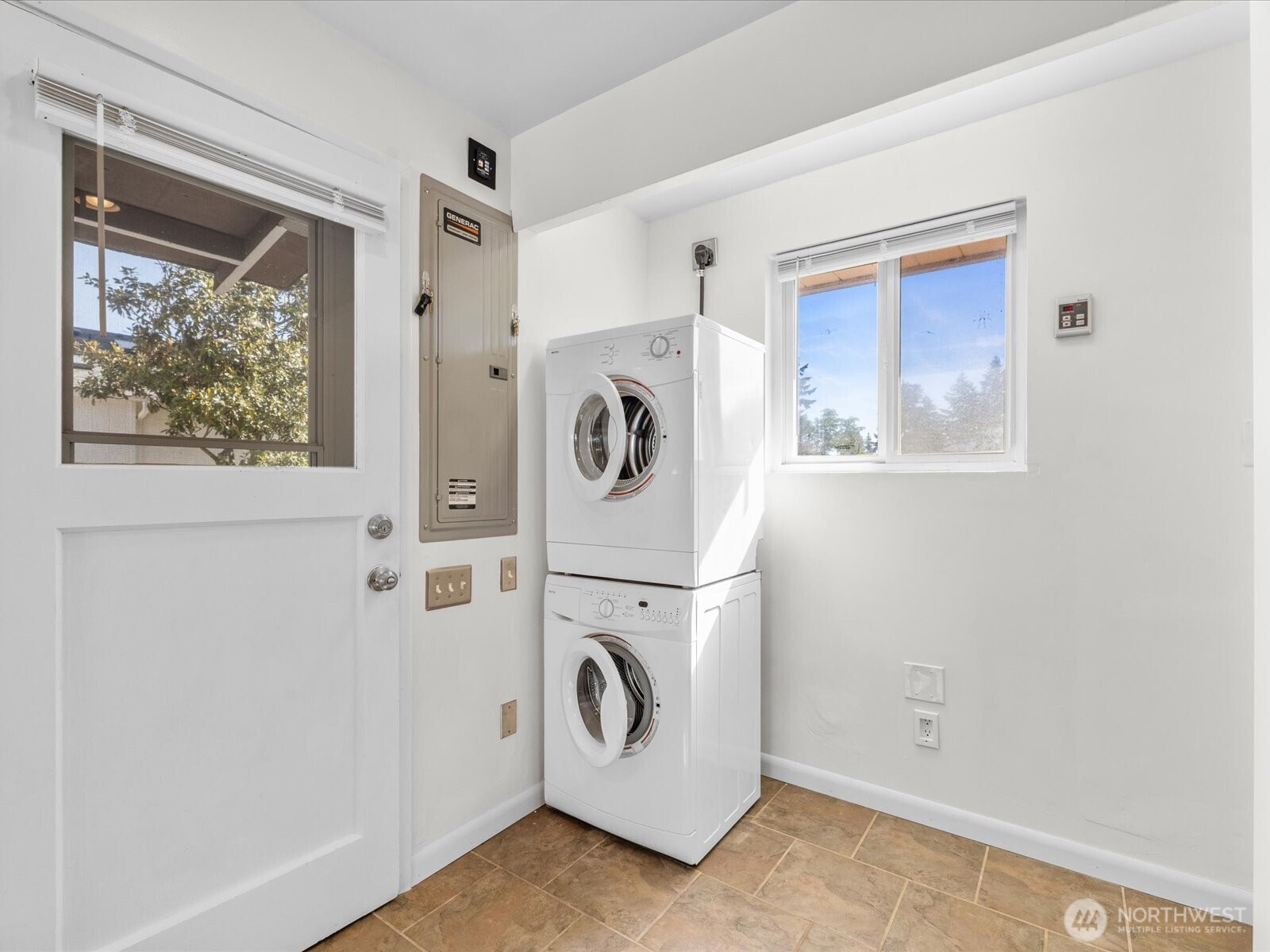 Stacked washer / dryer.  Bonus space for extra storage or pantry.