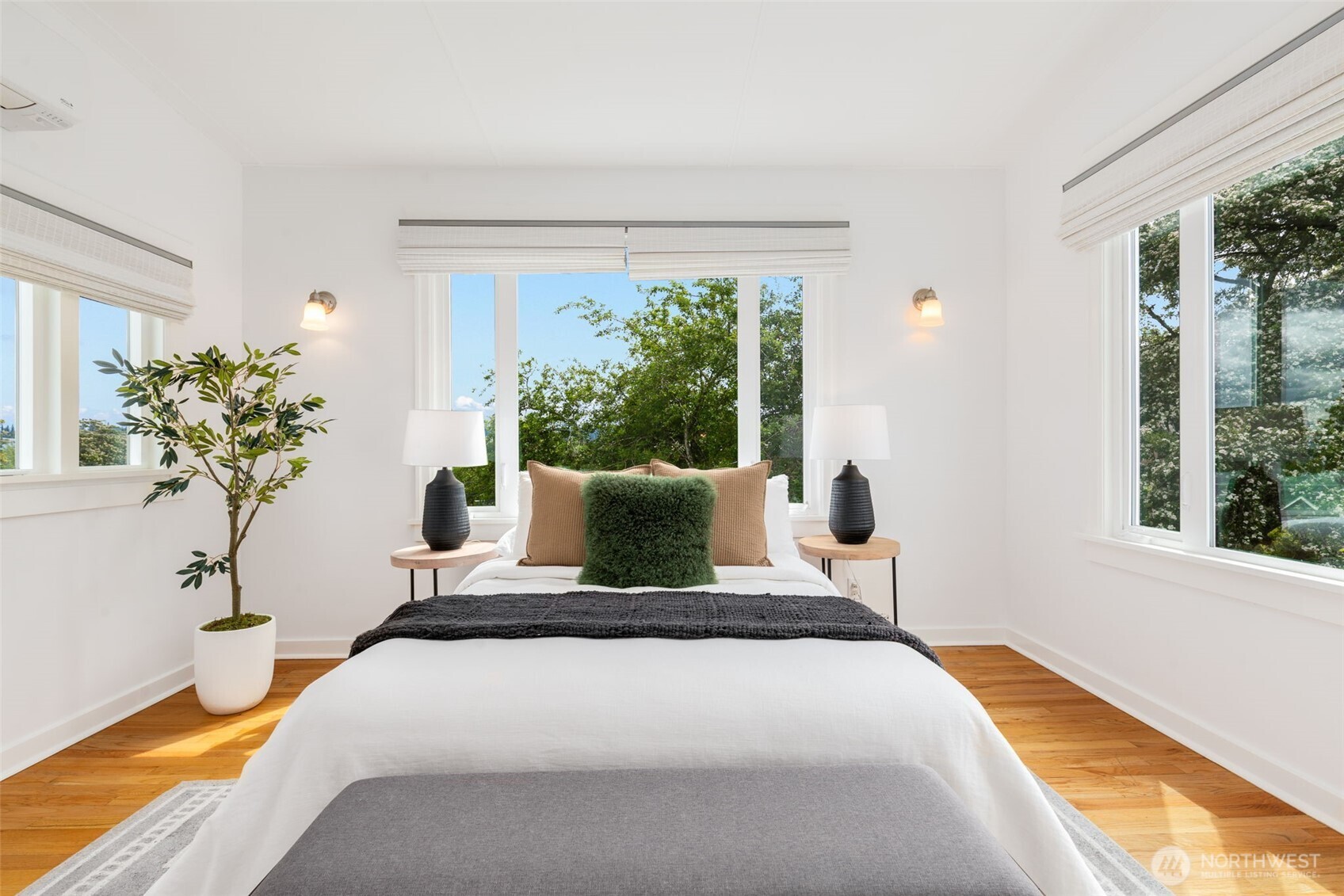 Upstairs primary suite with Mt. Rainier and city light views