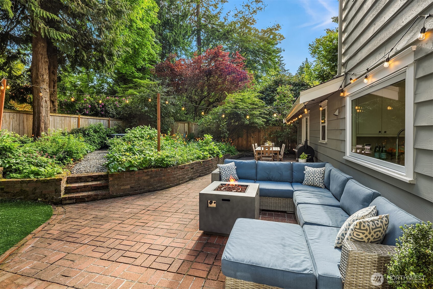 Ever get home from a busy day and just want to take a load off? Well, here is the perfect place. Grab the newspaper and relax and restore while looking over your stunning gardens just bursting with perennials that flower all summer long.