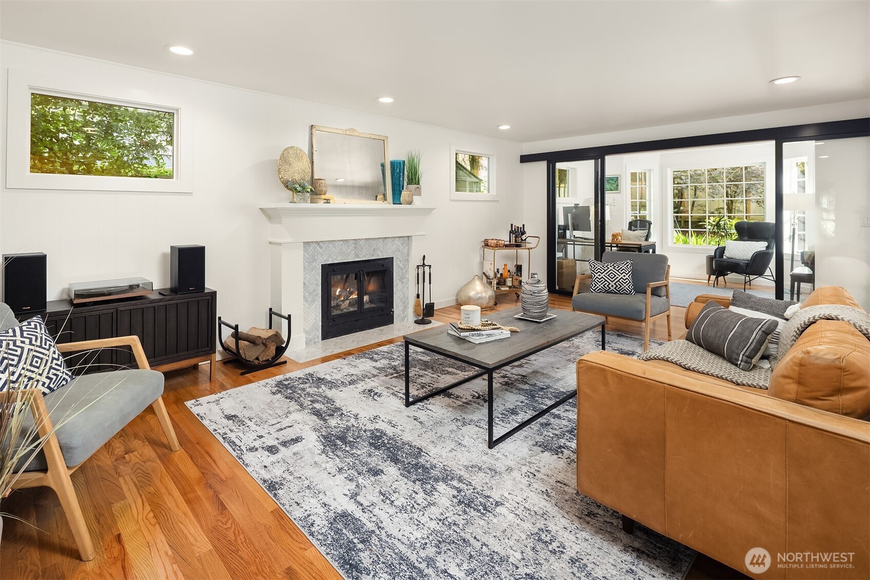 Look at those beautiful floors. This gracious residence boasts gorgeous gleaming hardwoods throughout on both floors.