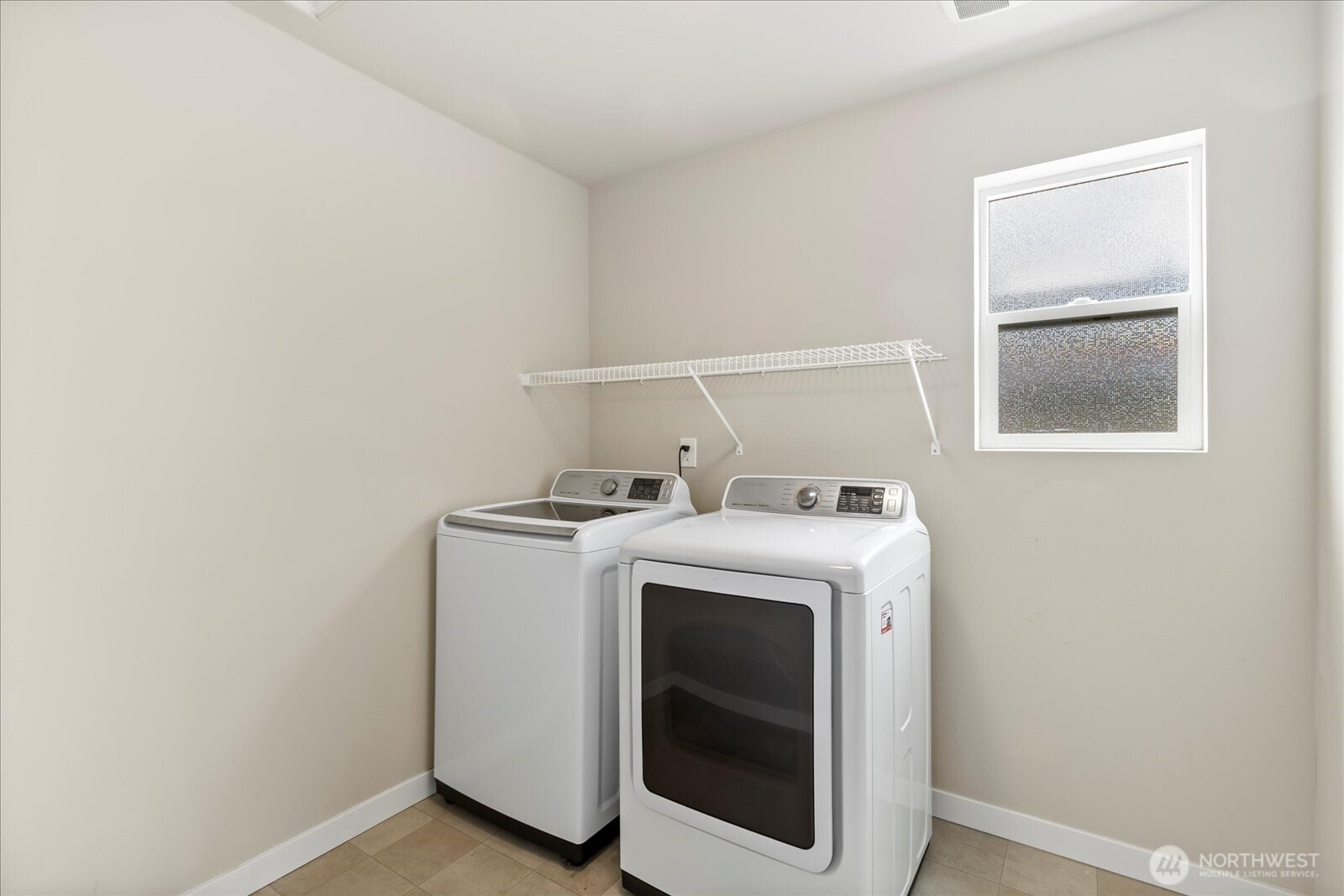 Laundry rm located on same floor as bedrooms.