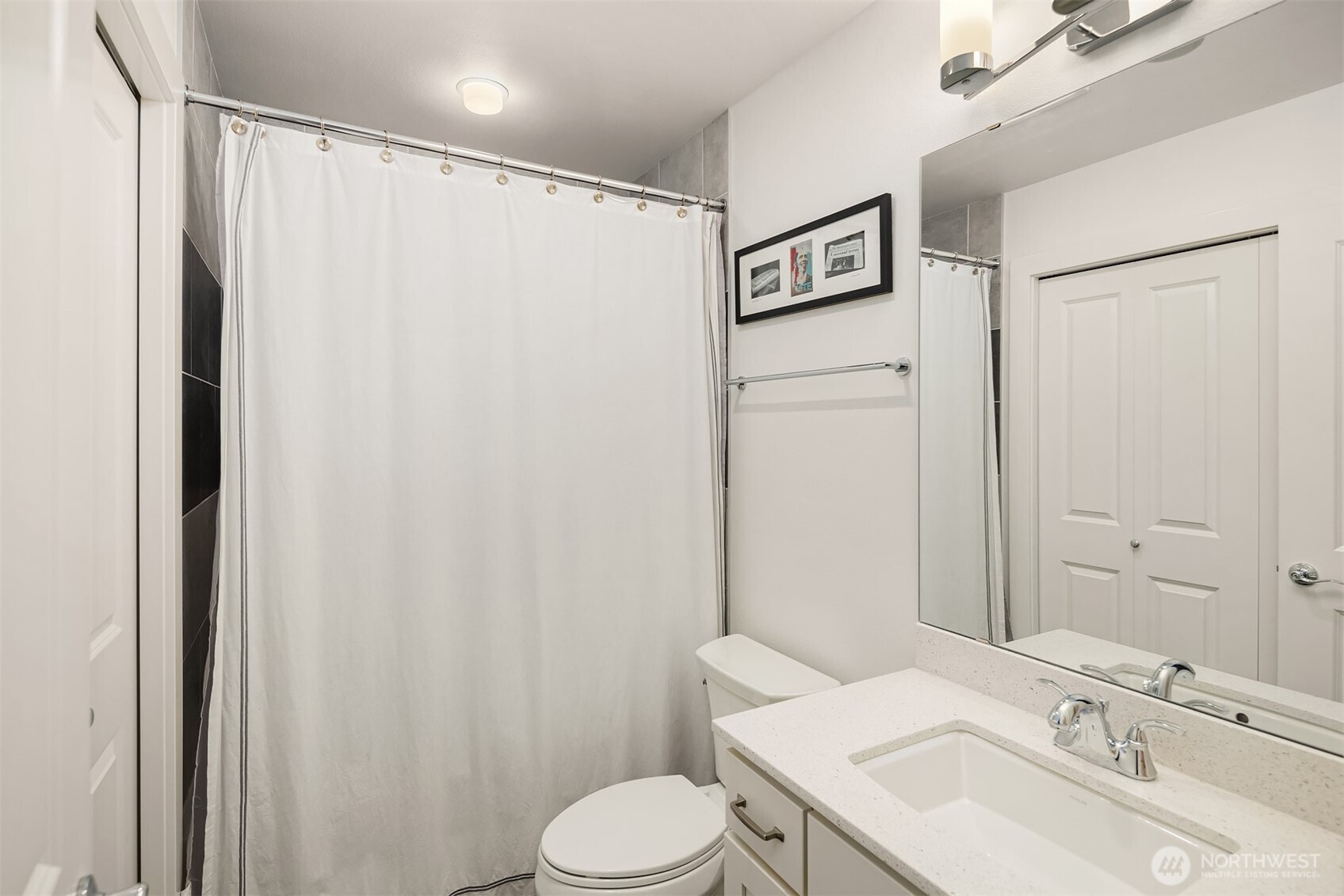 A full en-suite bathroom complements the room, providing a private and personal retreat.
