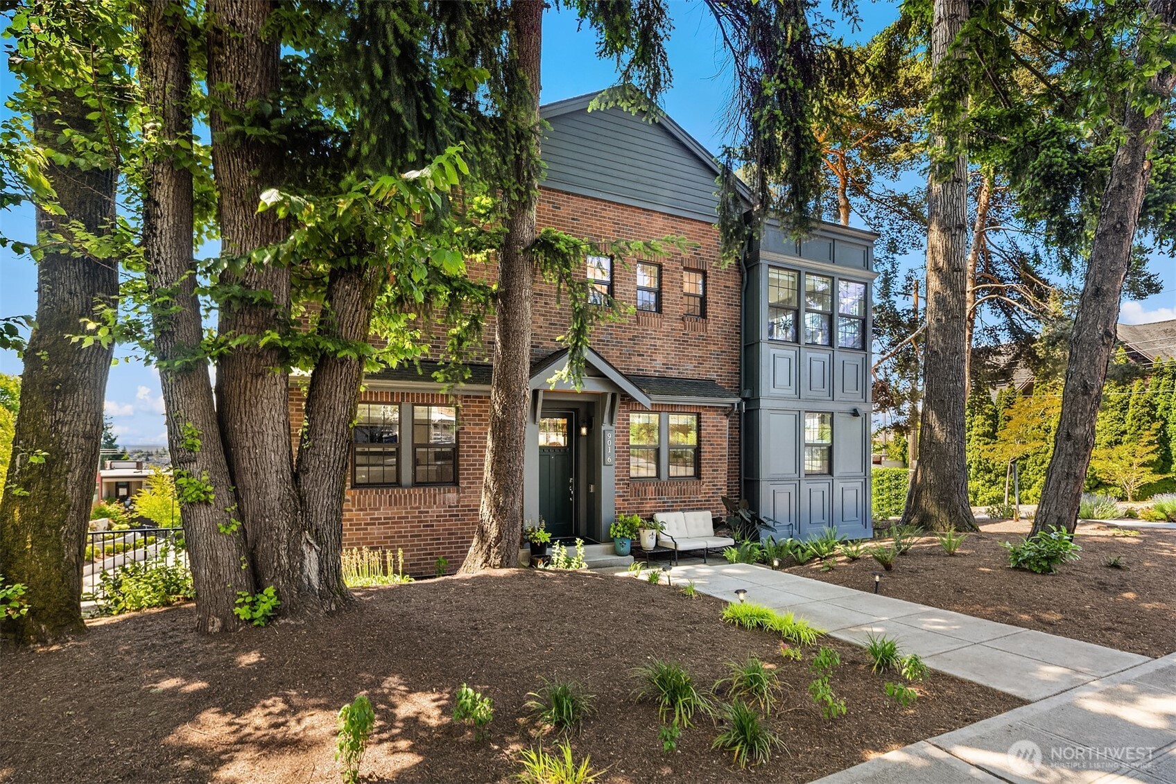 This townhome community offers convenient garage access and beautifully maintained grounds that elevate the neighborhood’s charm.